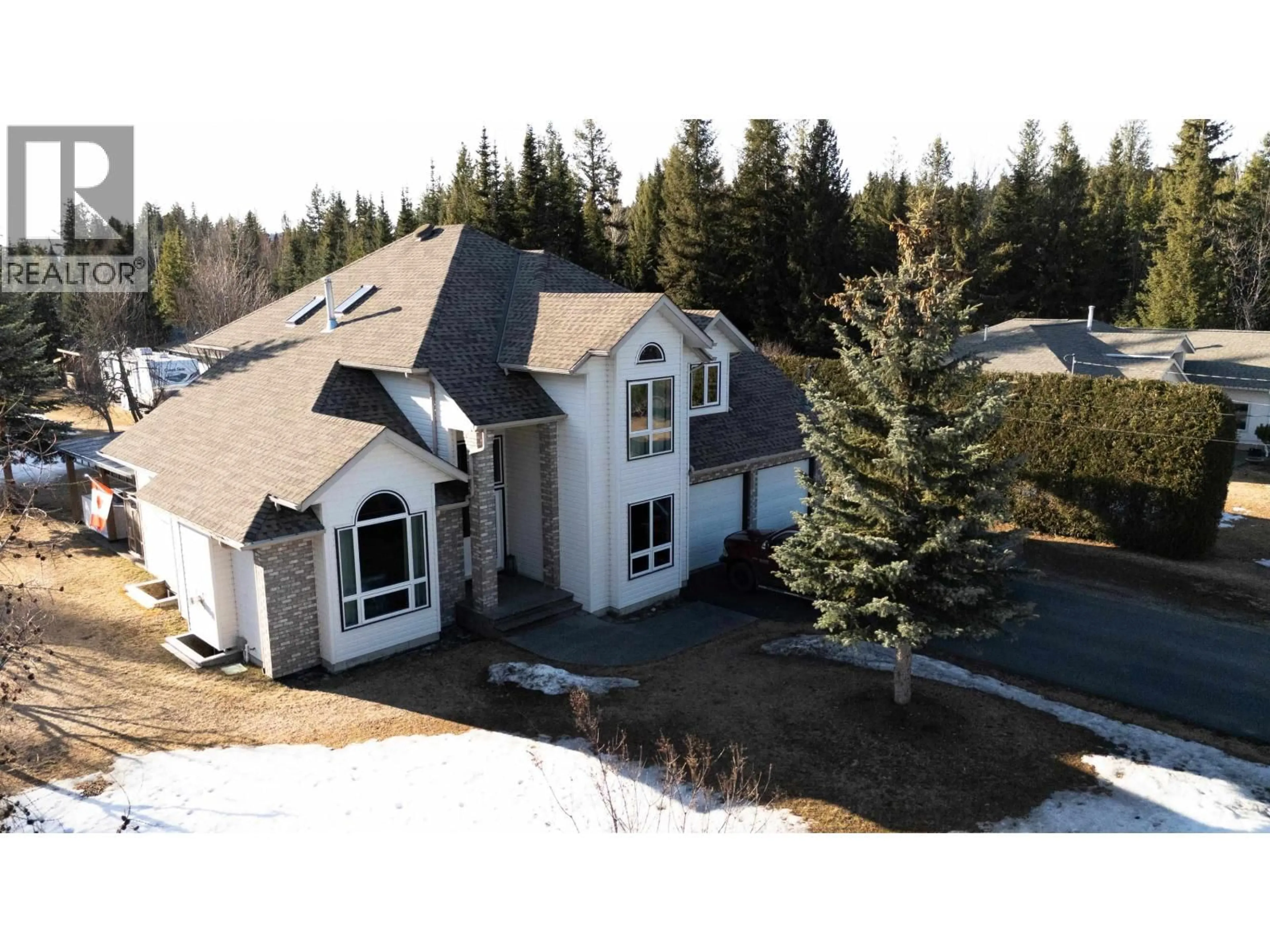 A pic from outside/outdoor area/front of a property/back of a property/a pic from drone, mountain view for 4099 EVA PLACE, Prince George British Columbia V2K4Z4