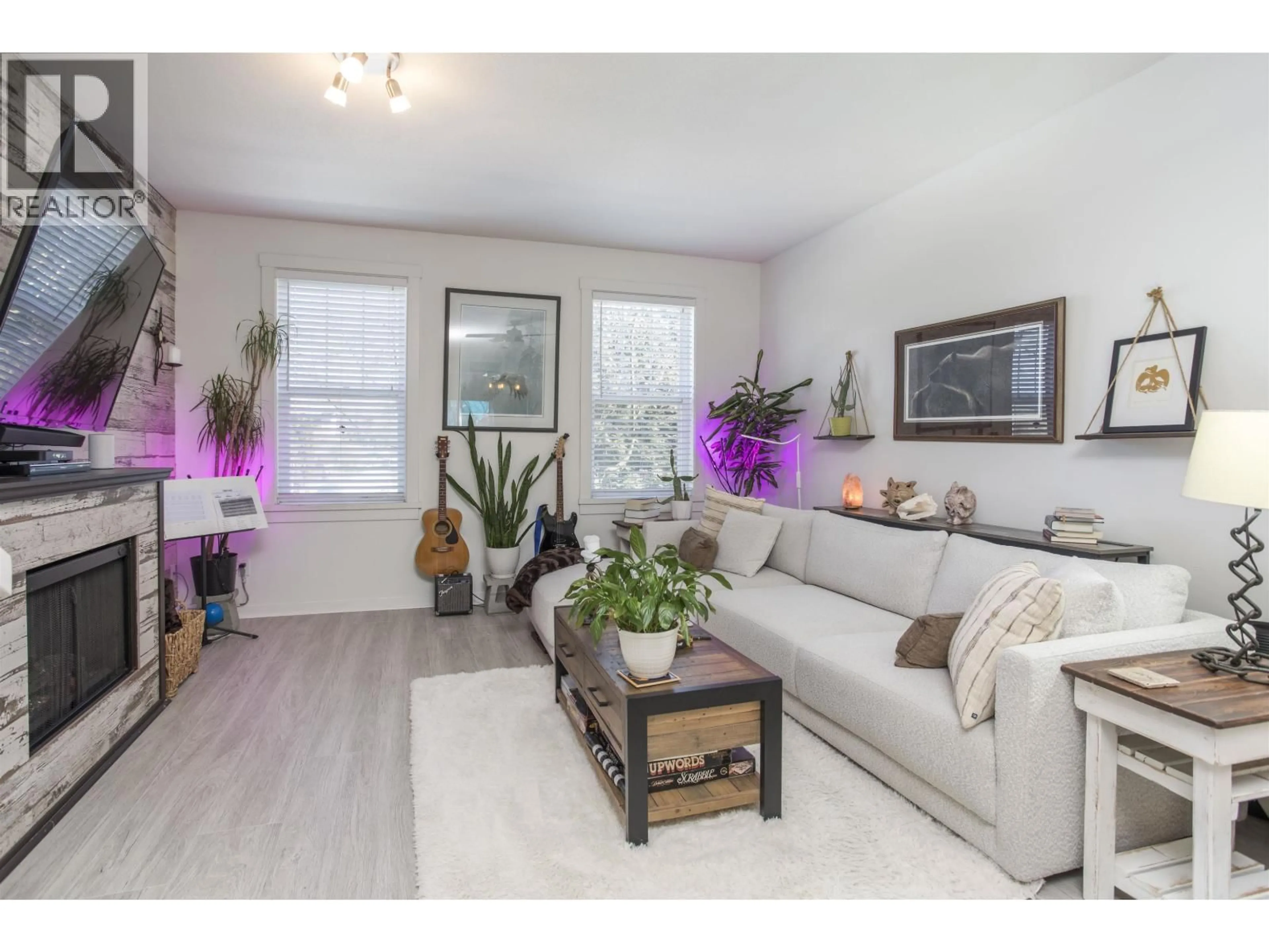 Living room with furniture, wood/laminate floor for 69 - 19572 FRASER WAY, Pitt Meadows British Columbia V3Y0A9