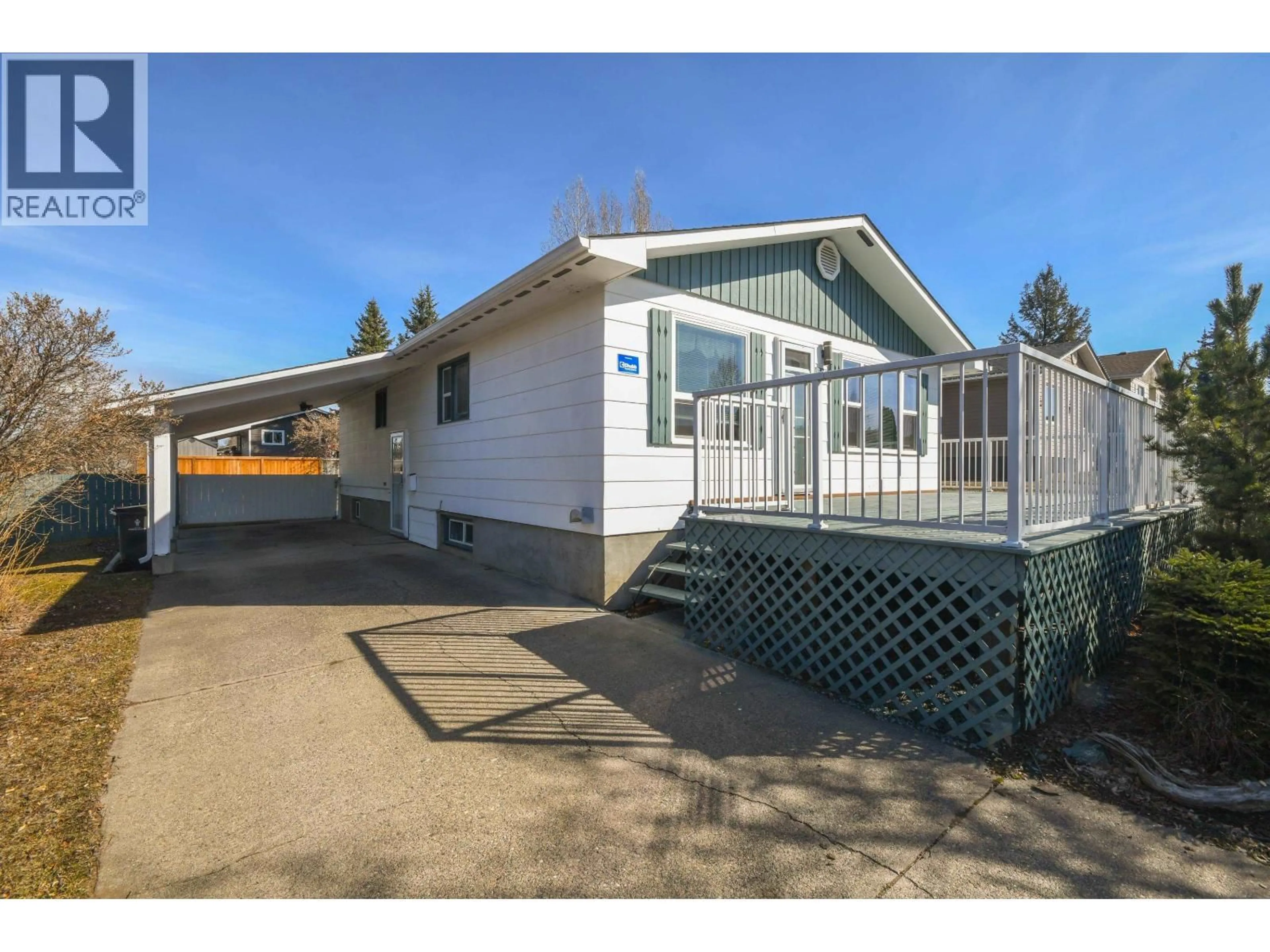 Home with vinyl exterior material, street for 310 CORLESS CRESCENT, Prince George British Columbia V2M5Y1