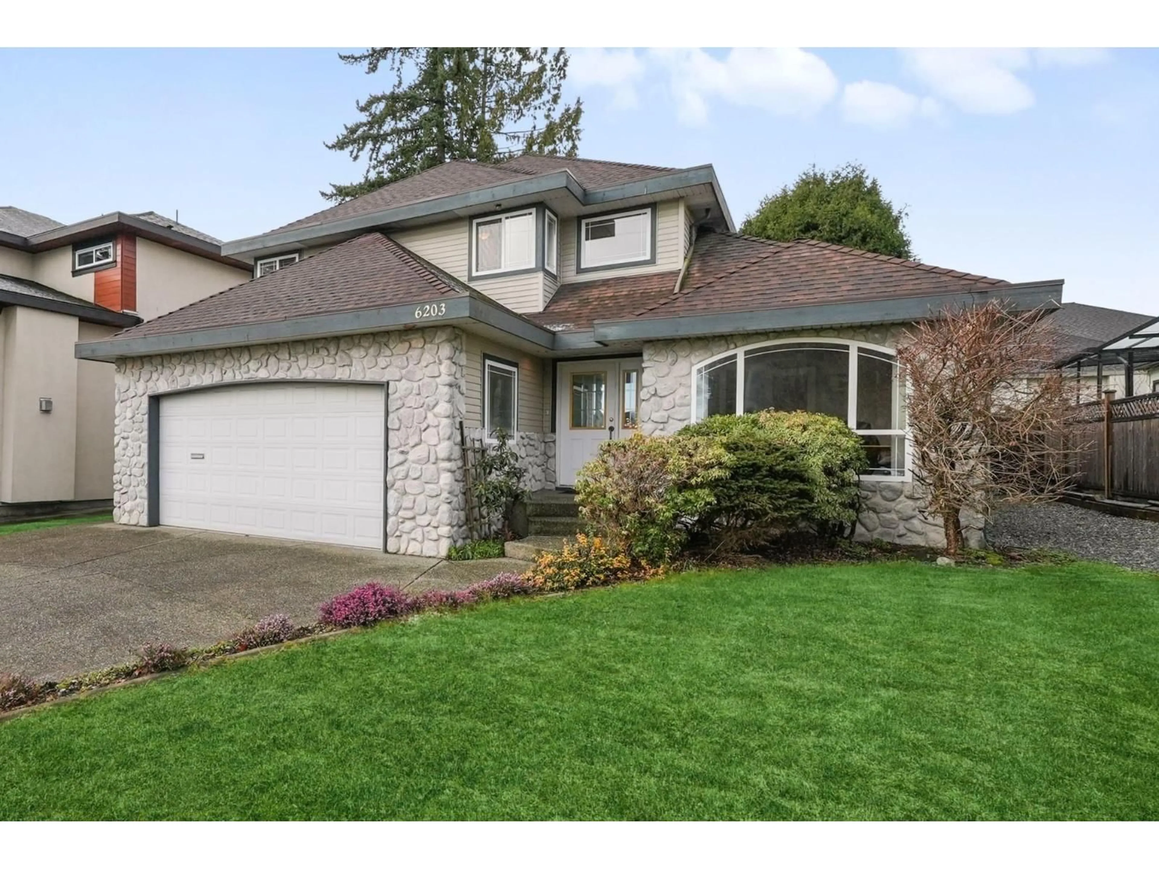 Home with vinyl exterior material, street for 6203 190 STREET, Surrey British Columbia V3S8S4