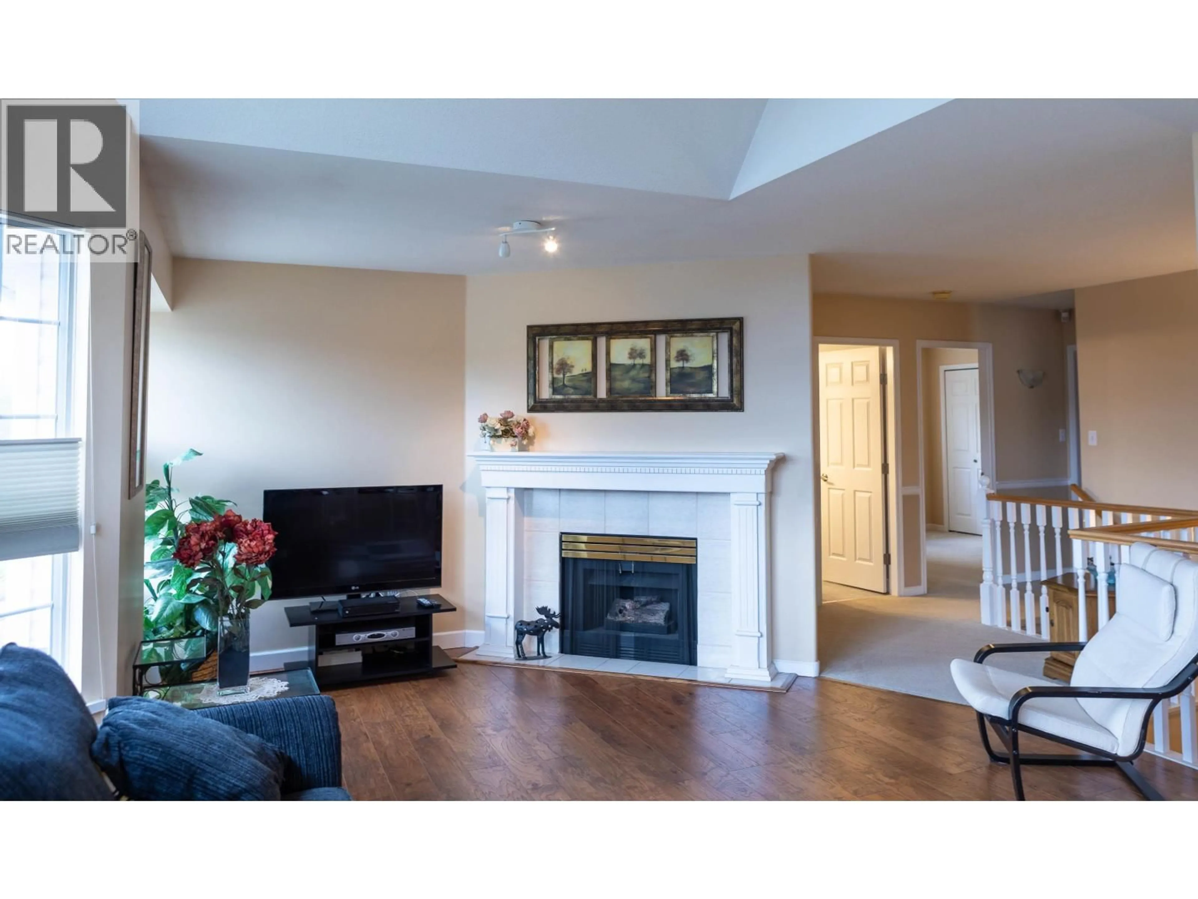 Living room with furniture, wood/laminate floor for 888 HERRMANN STREET, Coquitlam British Columbia V3C6E7