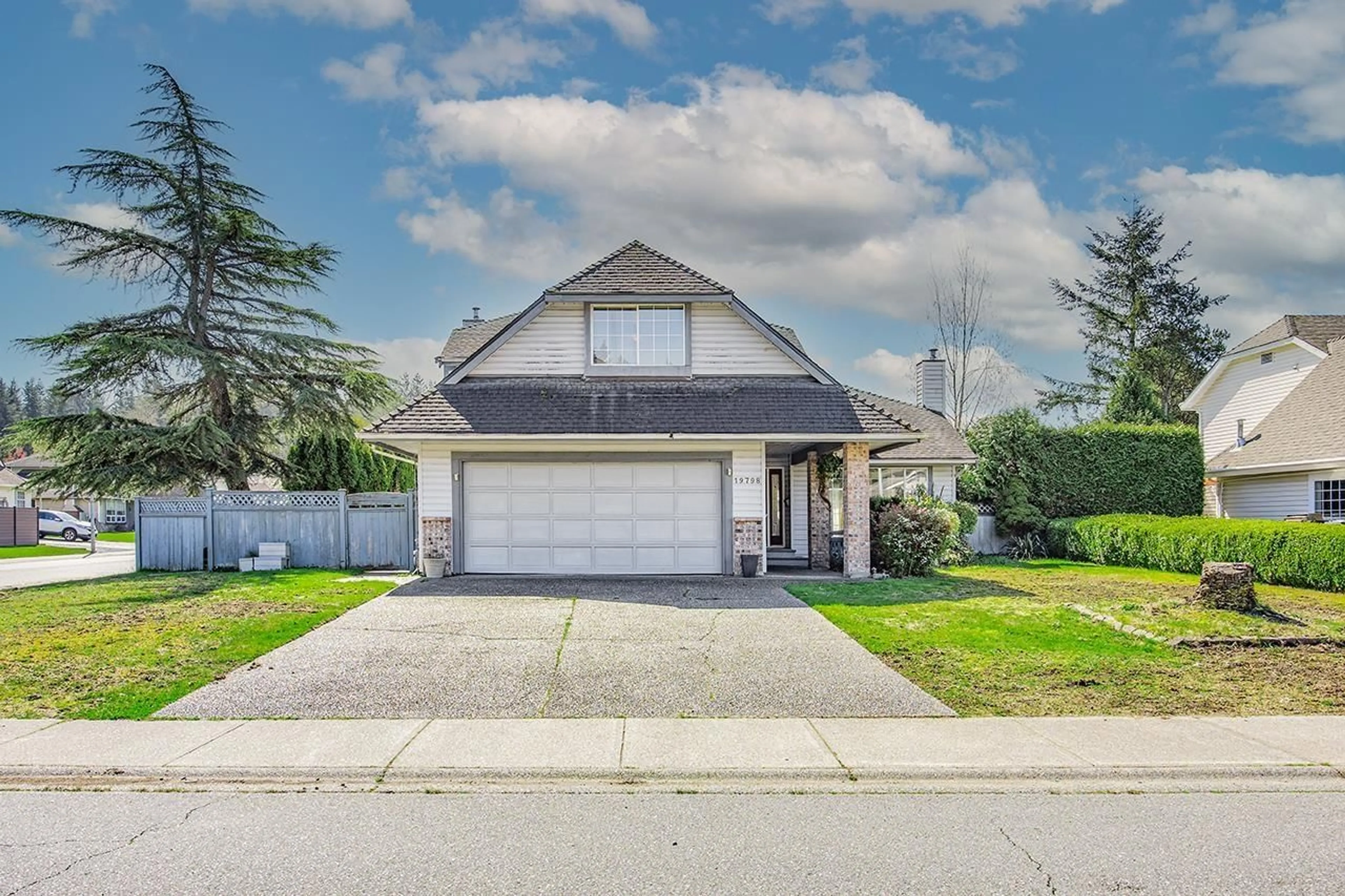 Home with vinyl exterior material, street for 19798 34A AVENUE, Langley British Columbia V3A7W6
