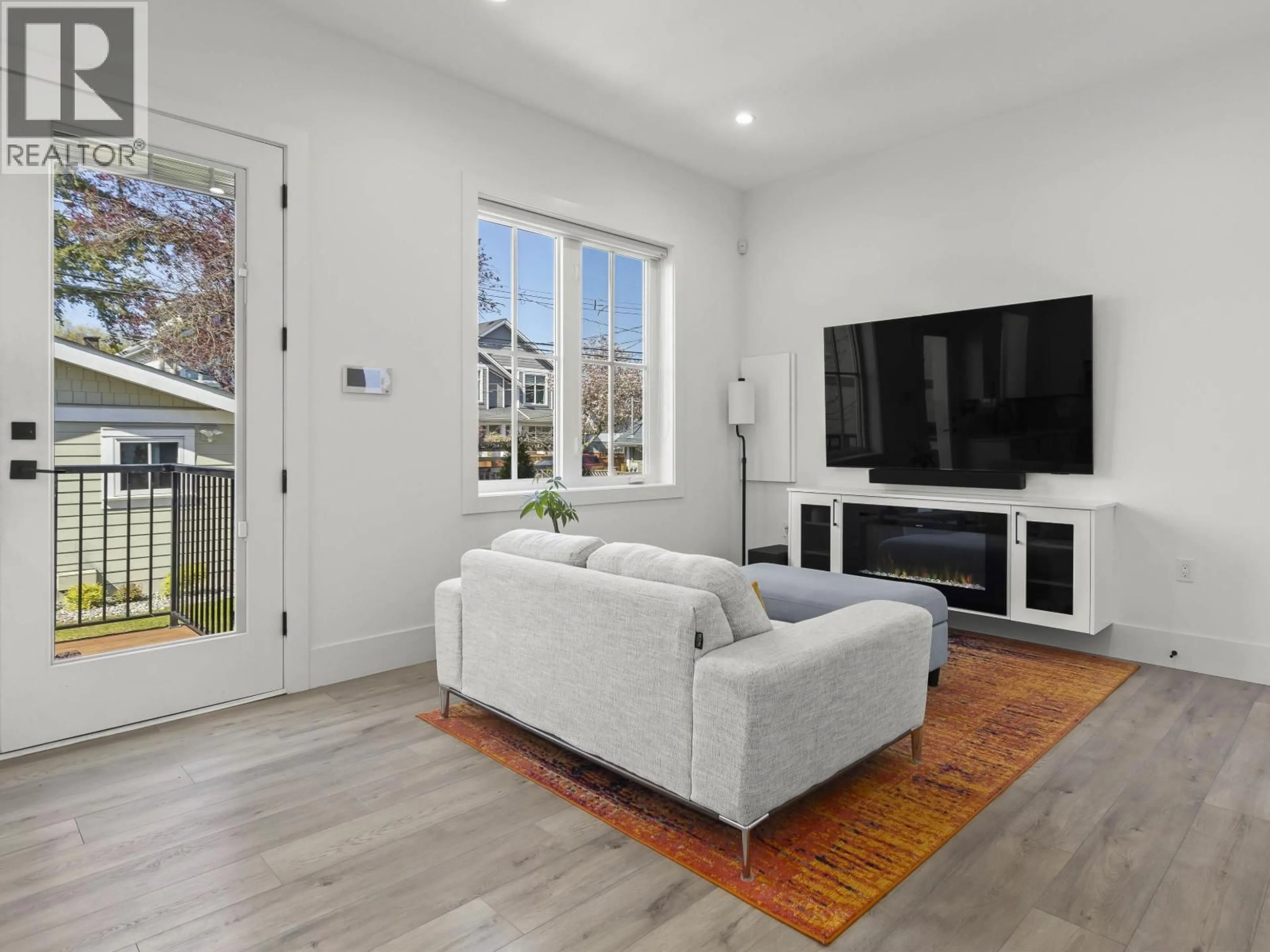 Living room with furniture, unknown for 4327 PERRY STREET, Vancouver British Columbia V5N3X6