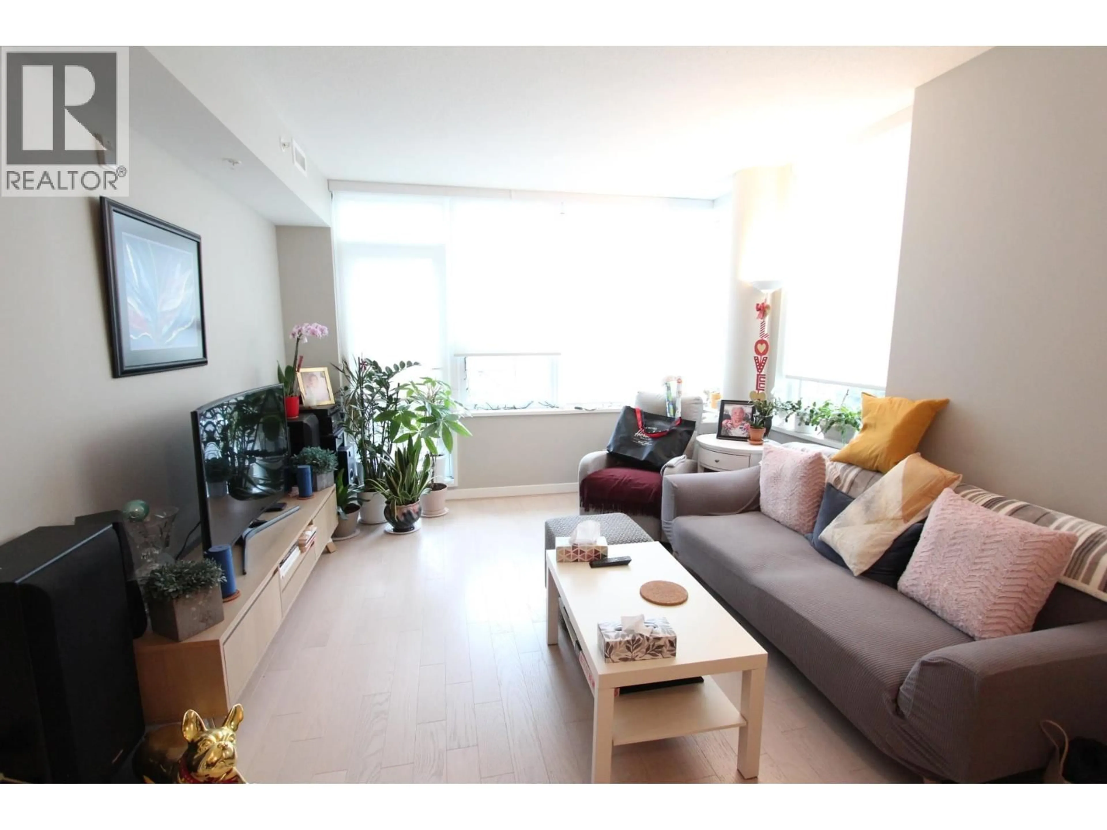 Living room with furniture, wood/laminate floor for 202 - 505 30TH AVENUE, Vancouver British Columbia V5Z0G4