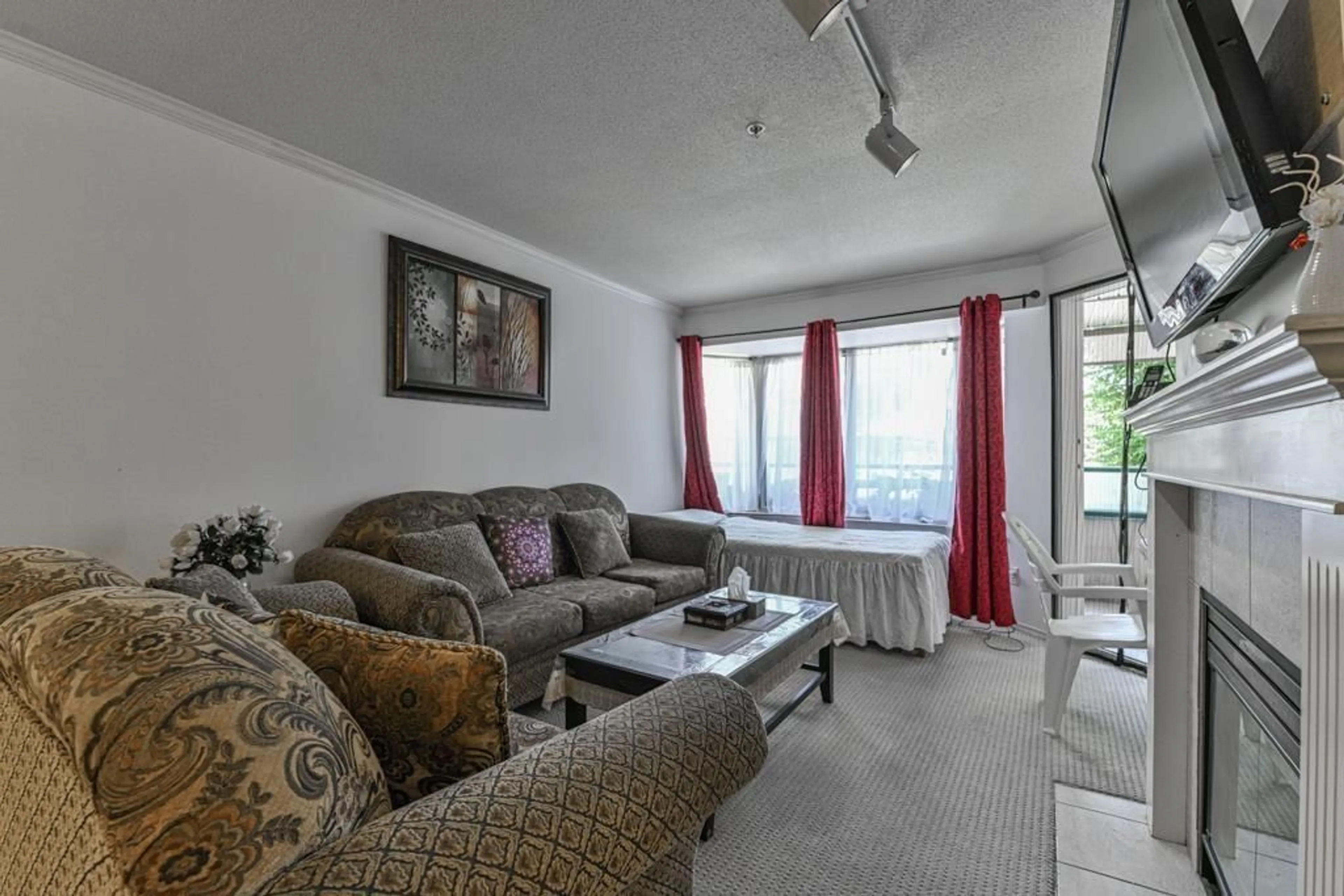 Living room with furniture, unknown for 208 - 2960 TRETHEWEY STREET, Abbotsford British Columbia V2T6P5