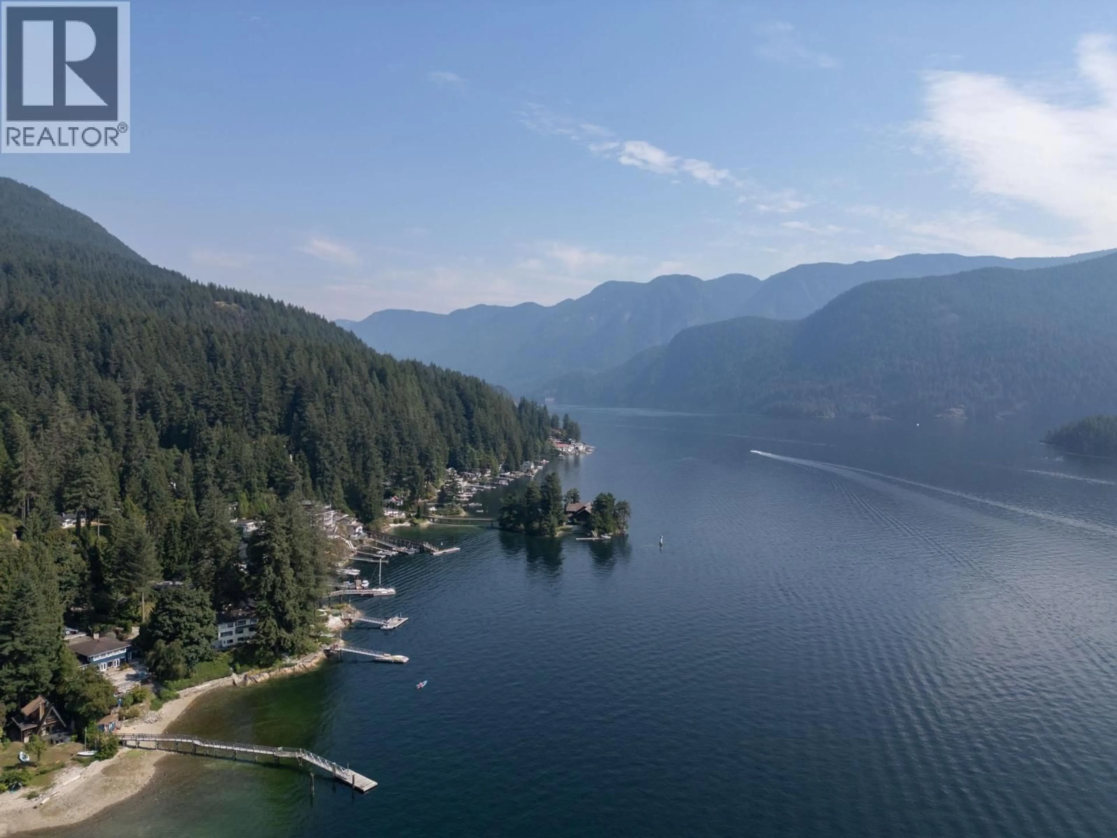 A pic from outside/outdoor area/front of a property/back of a property/a pic from drone, water/lake/river/ocean view for 5439 INDIAN RIVER DRIVE, North Vancouver British Columbia V7G2T7