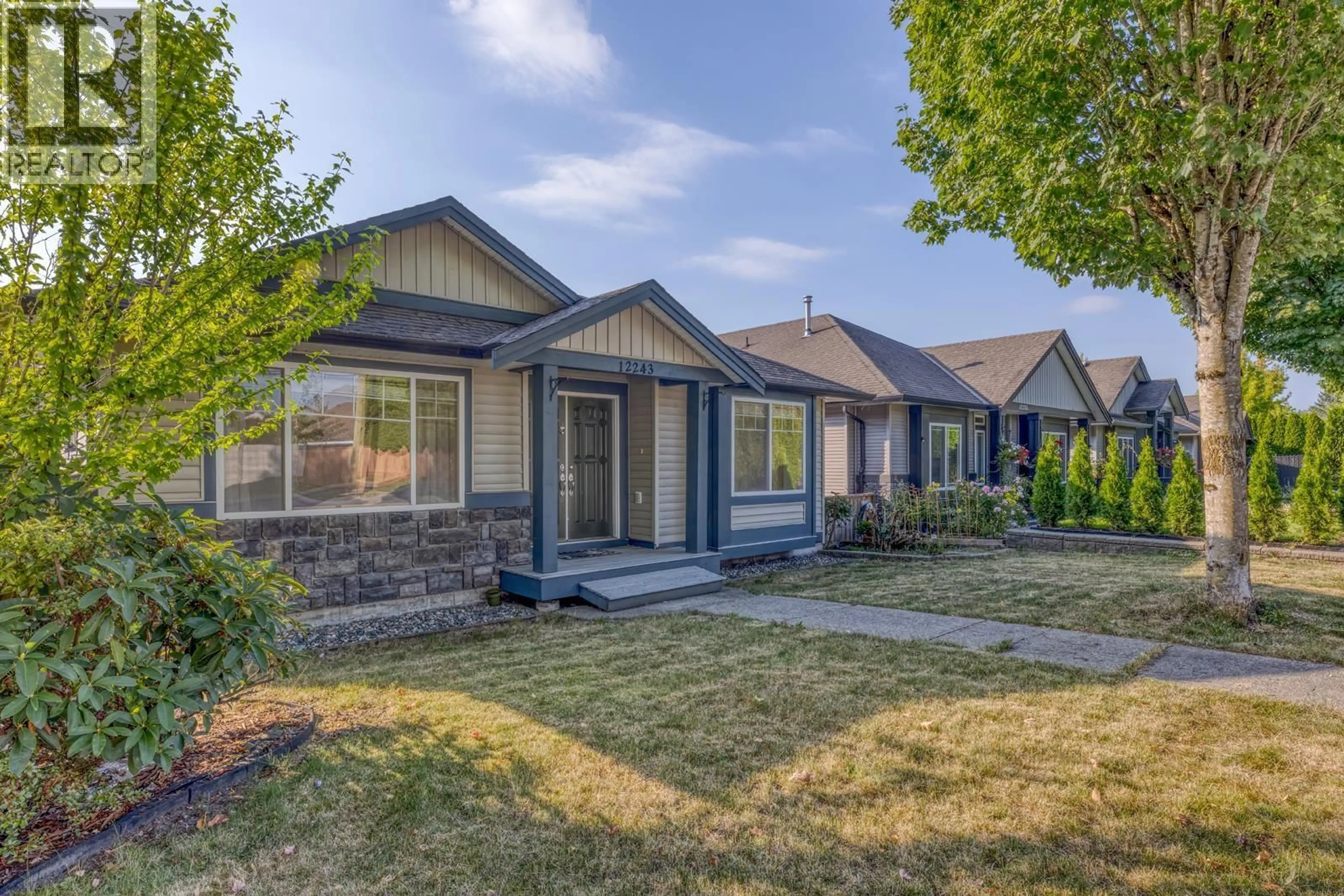 Home with vinyl exterior material, street for 12243 232 STREET, Maple Ridge British Columbia V2X6T4