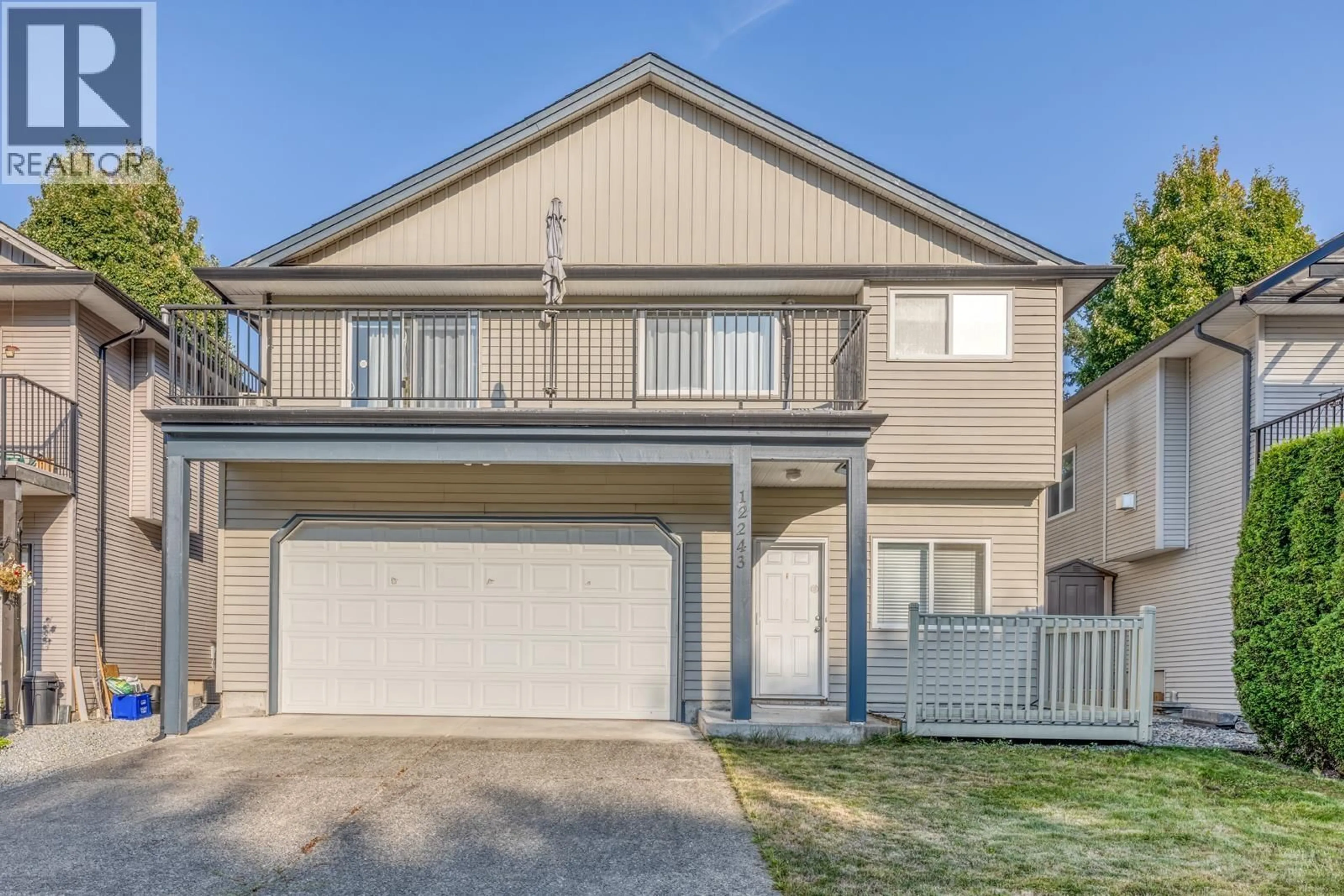 Home with vinyl exterior material, street for 12243 232 STREET, Maple Ridge British Columbia V2X6T4