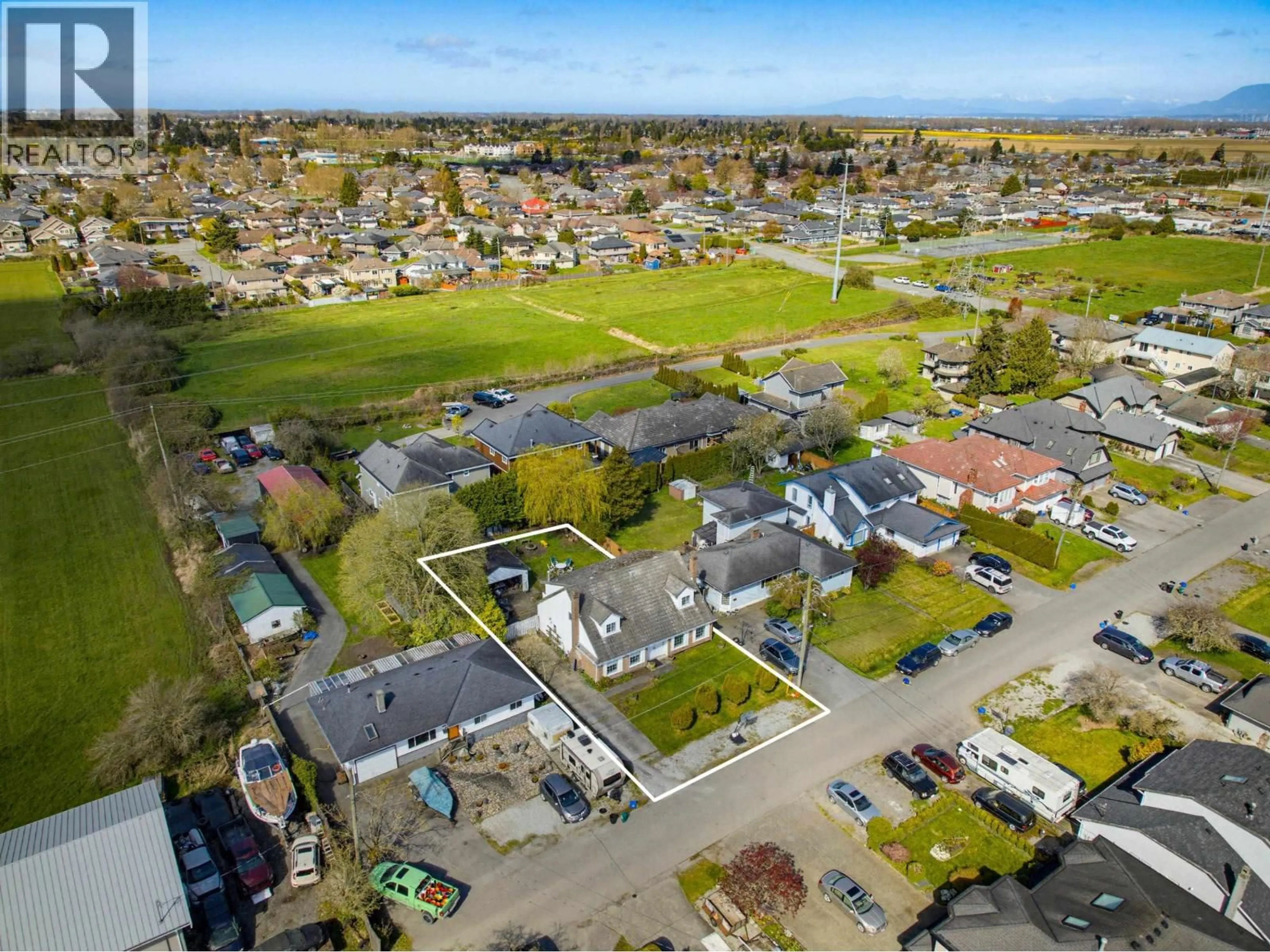 A pic from outside/outdoor area/front of a property/back of a property/a pic from drone, street for 4537 65A STREET, Delta British Columbia V4K4Y7