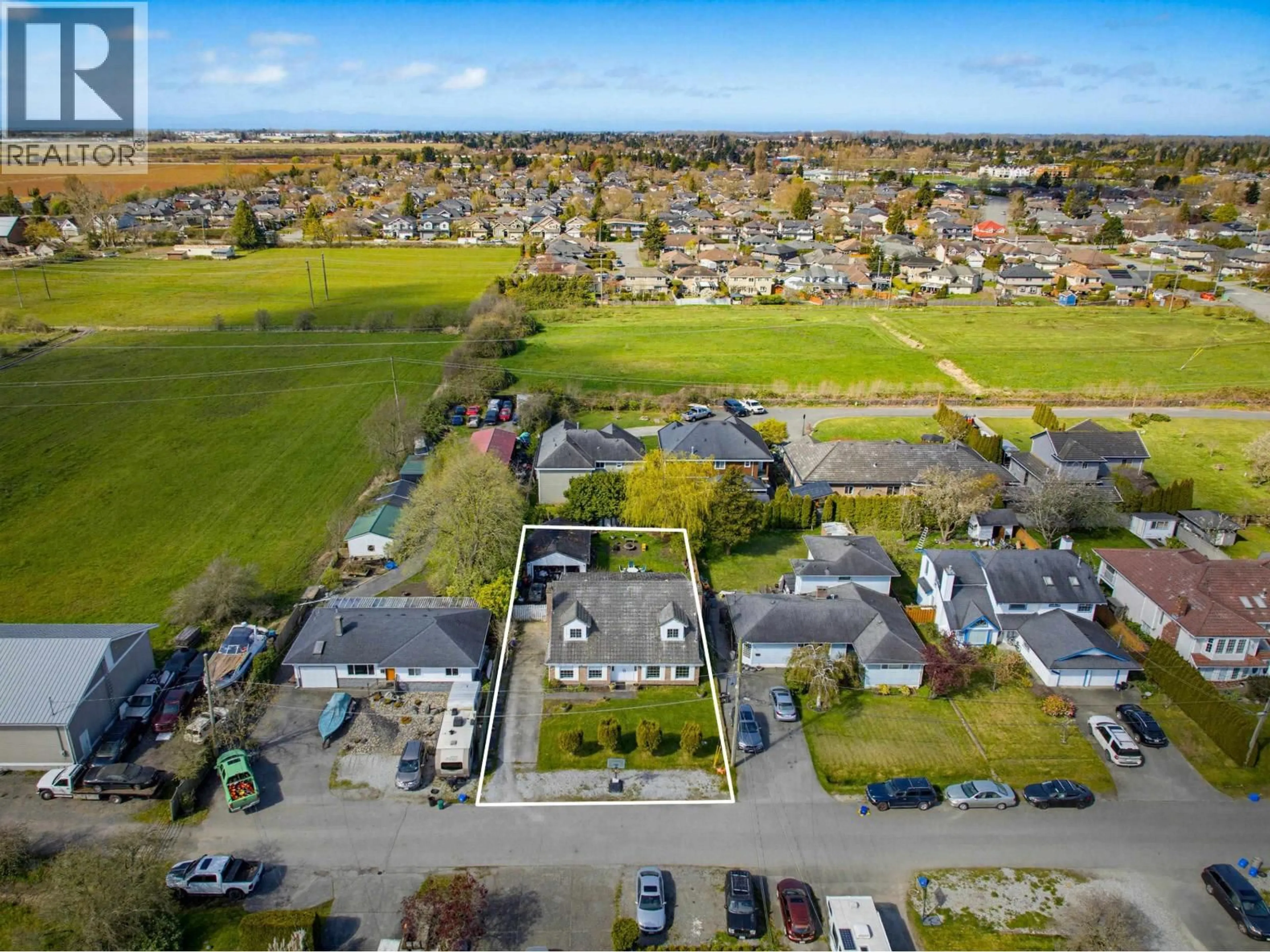 A pic from outside/outdoor area/front of a property/back of a property/a pic from drone, street for 4537 65A STREET, Delta British Columbia V4K4Y7