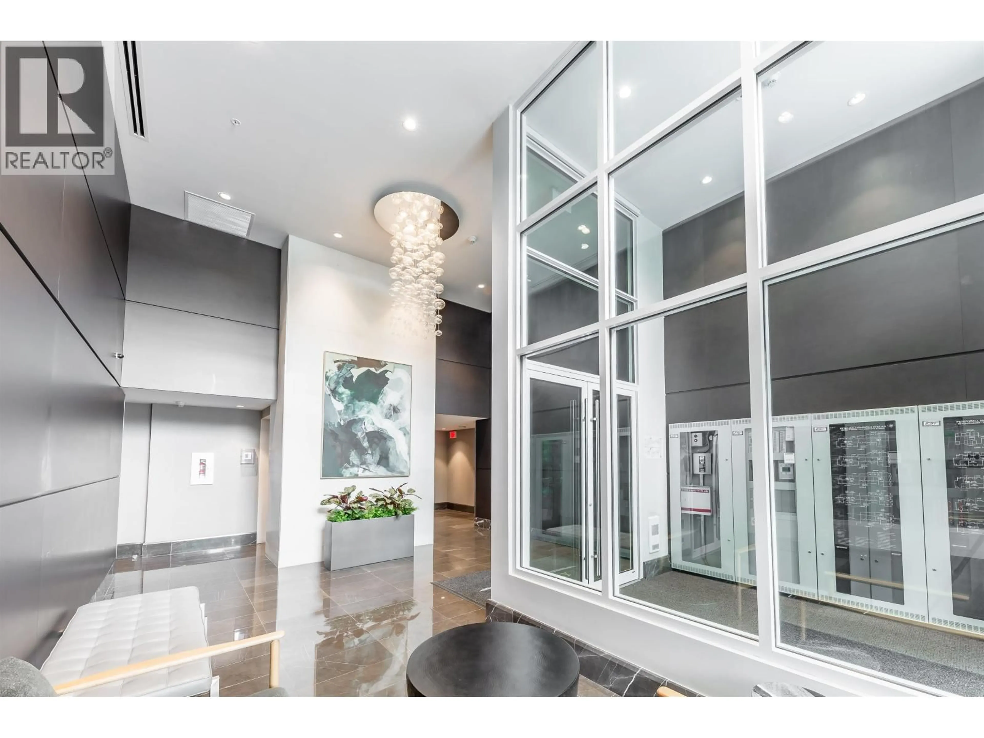 Indoor foyer for 201 - 1561 57TH AVENUE, Vancouver British Columbia V6P0H5