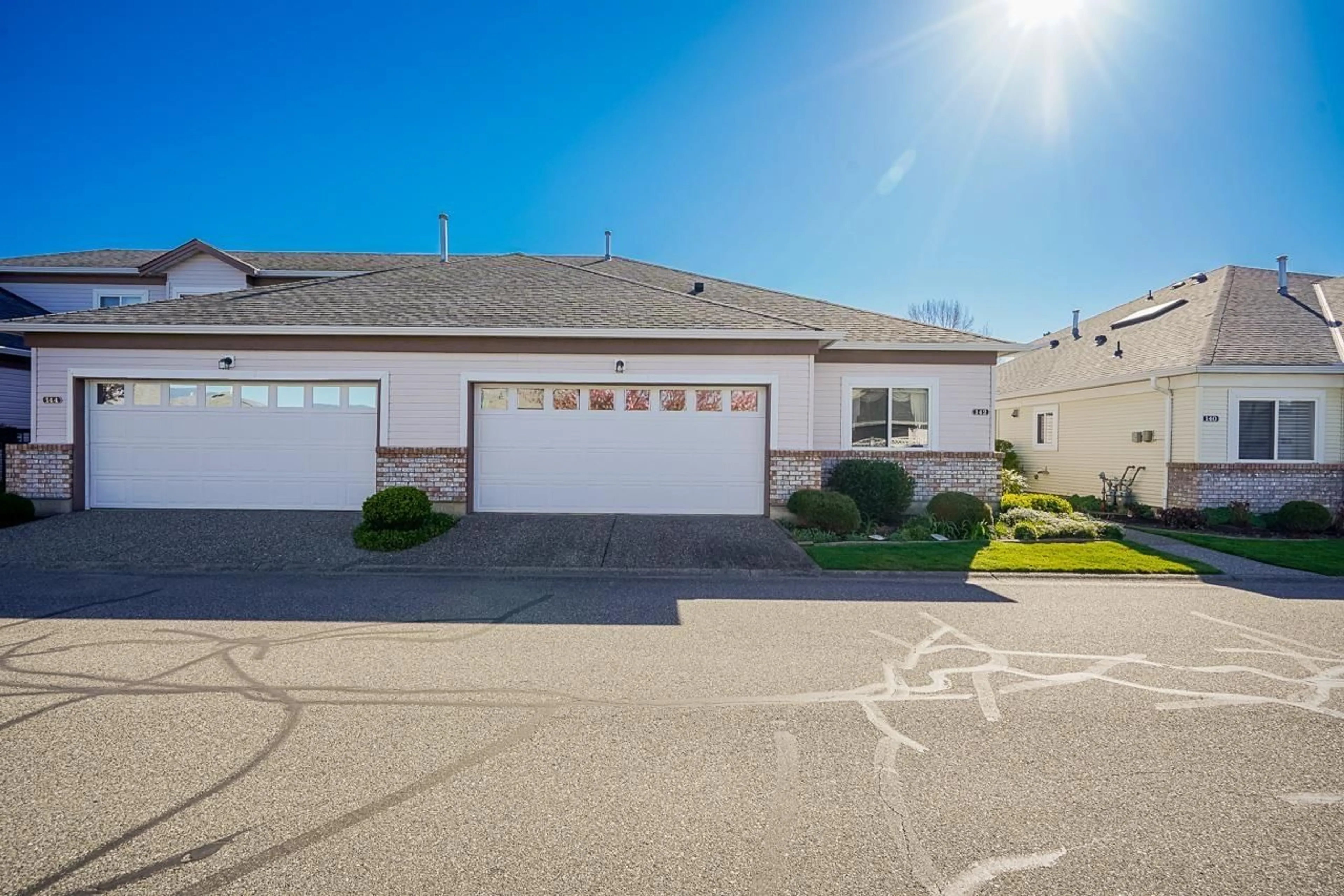 A pic from outside/outdoor area/front of a property/back of a property/a pic from drone, street for 142 - 8485 YOUNG ROAD, Chilliwack British Columbia V2P7Y7