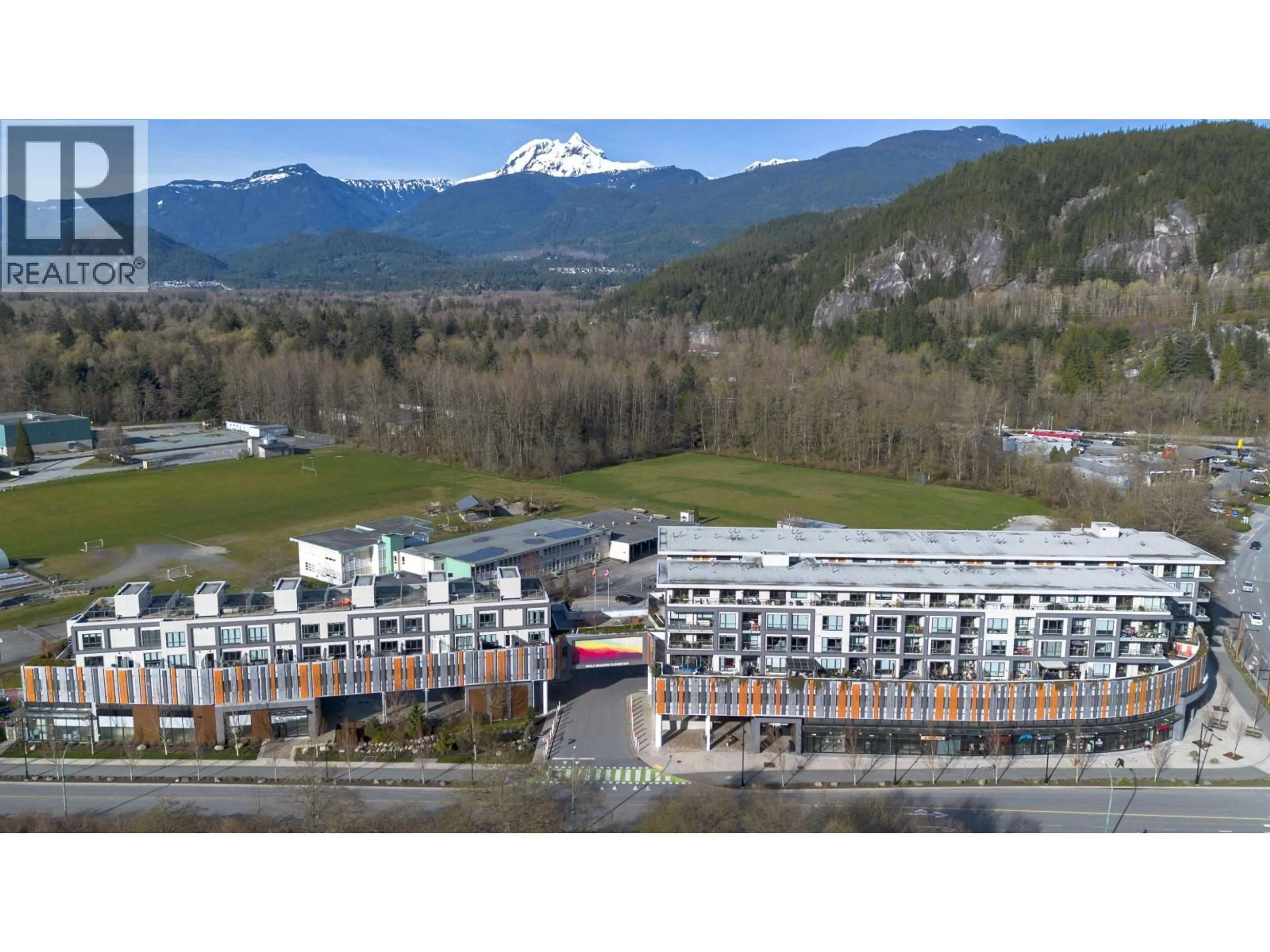 A pic from outside/outdoor area/front of a property/back of a property/a pic from drone, mountain view for 420 - 38362 BUCKLEY AVENUE, Squamish British Columbia V8B0J8
