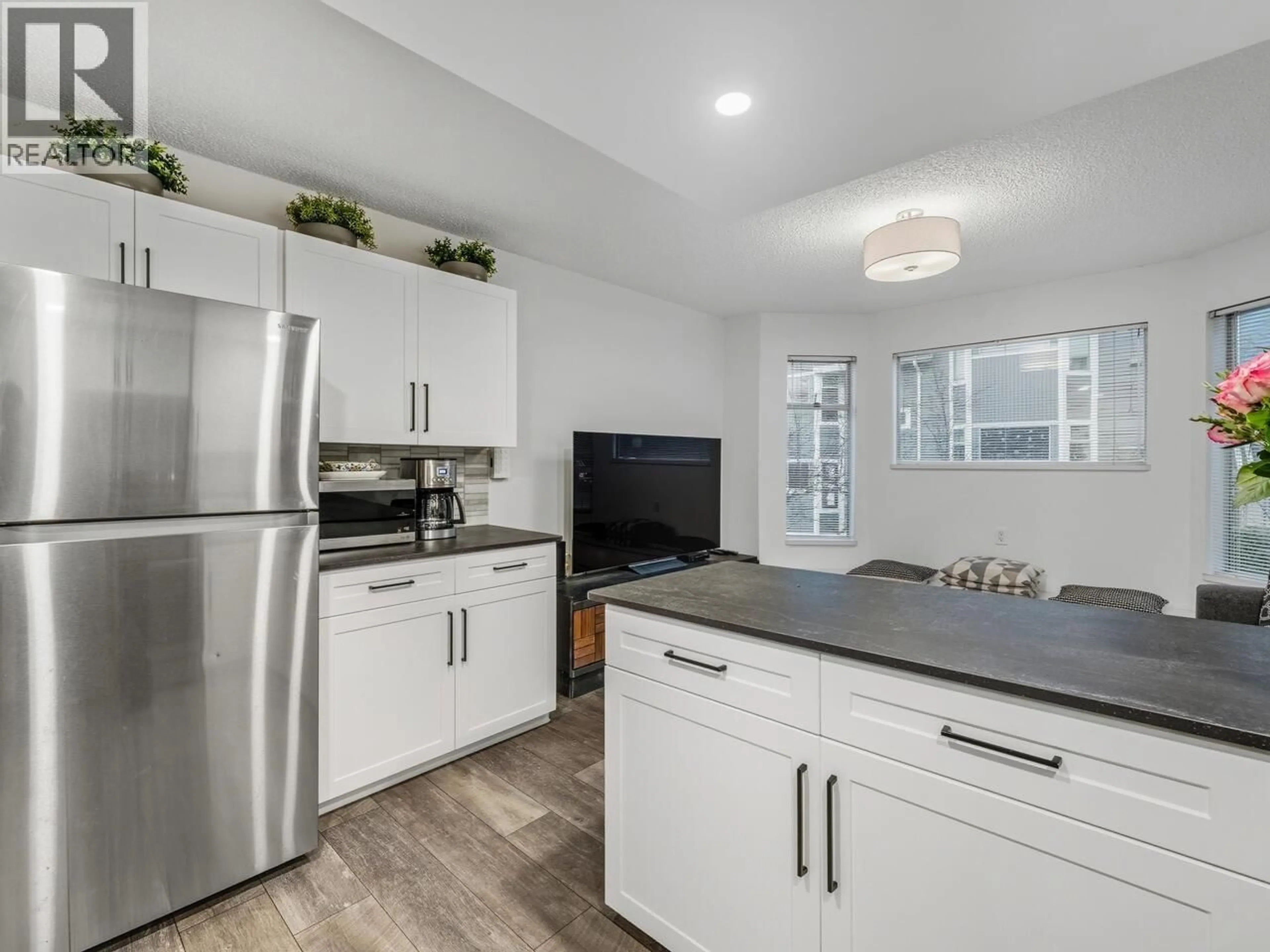 Open concept kitchen, ceramic/tile floor for 8616 SAFFRON PLACE, Burnaby British Columbia V5A4H9