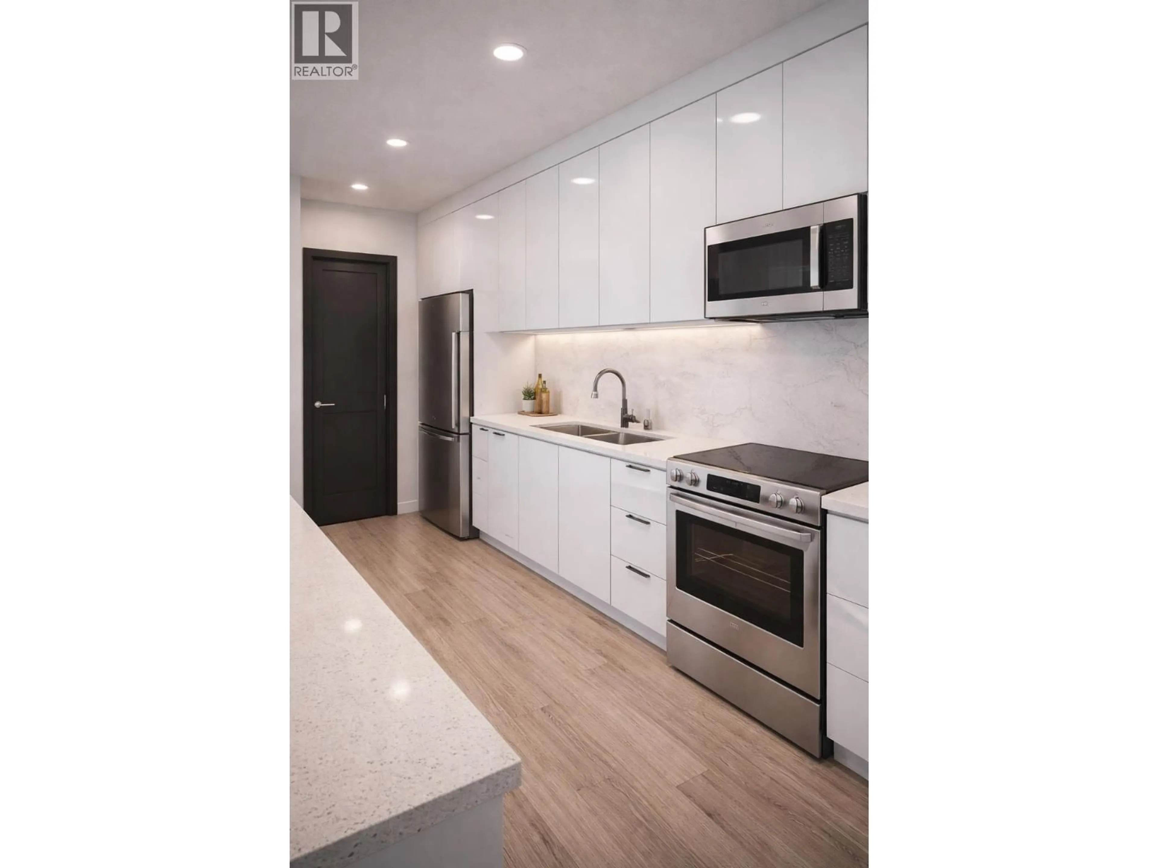 Open concept kitchen, unknown for 205 - 120 4TH STREET, North Vancouver British Columbia V7L1H6