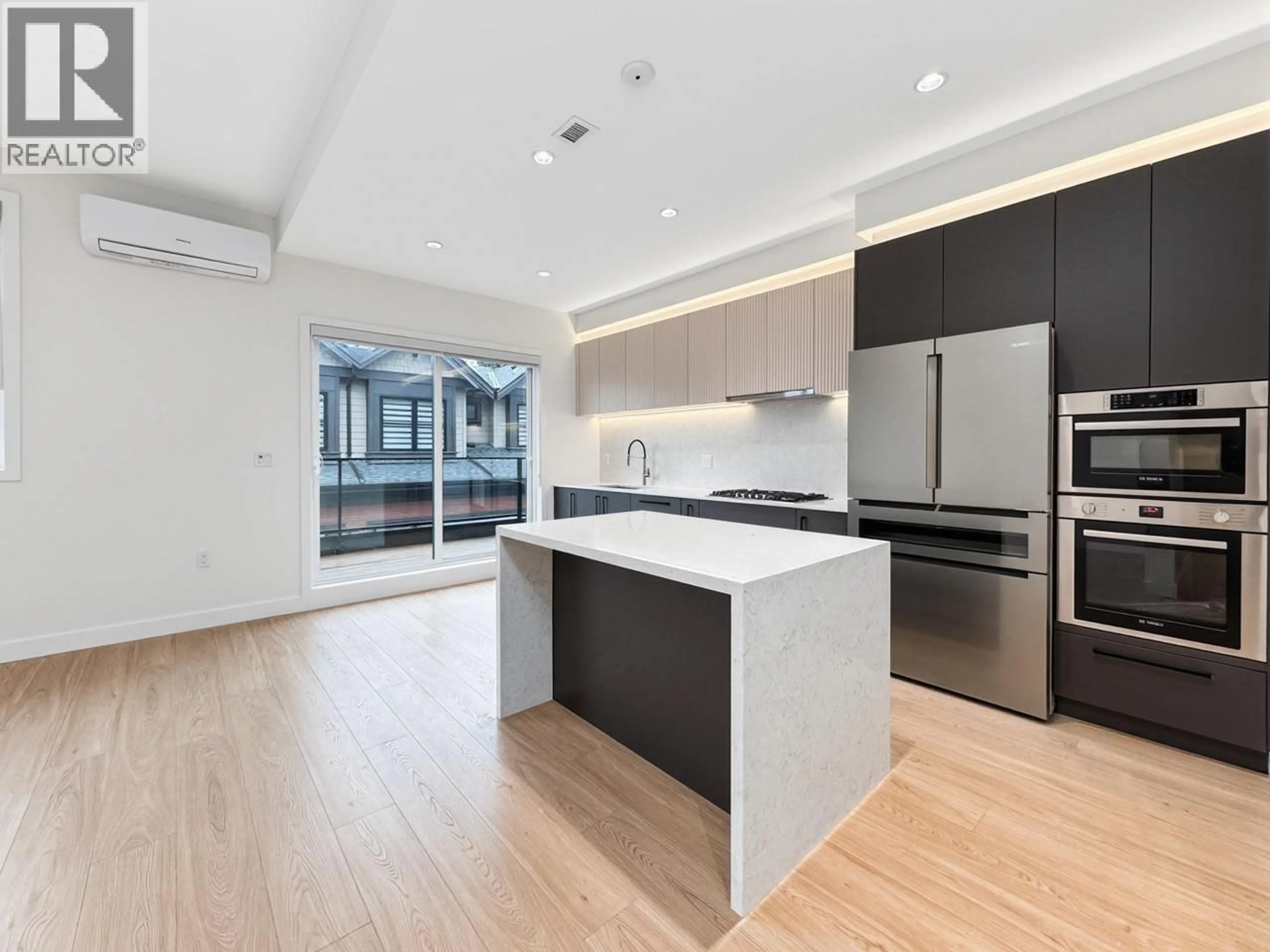 Open concept kitchen, unknown for 11 - 10233 NO. 2 ROAD, Richmond British Columbia V7E0C7
