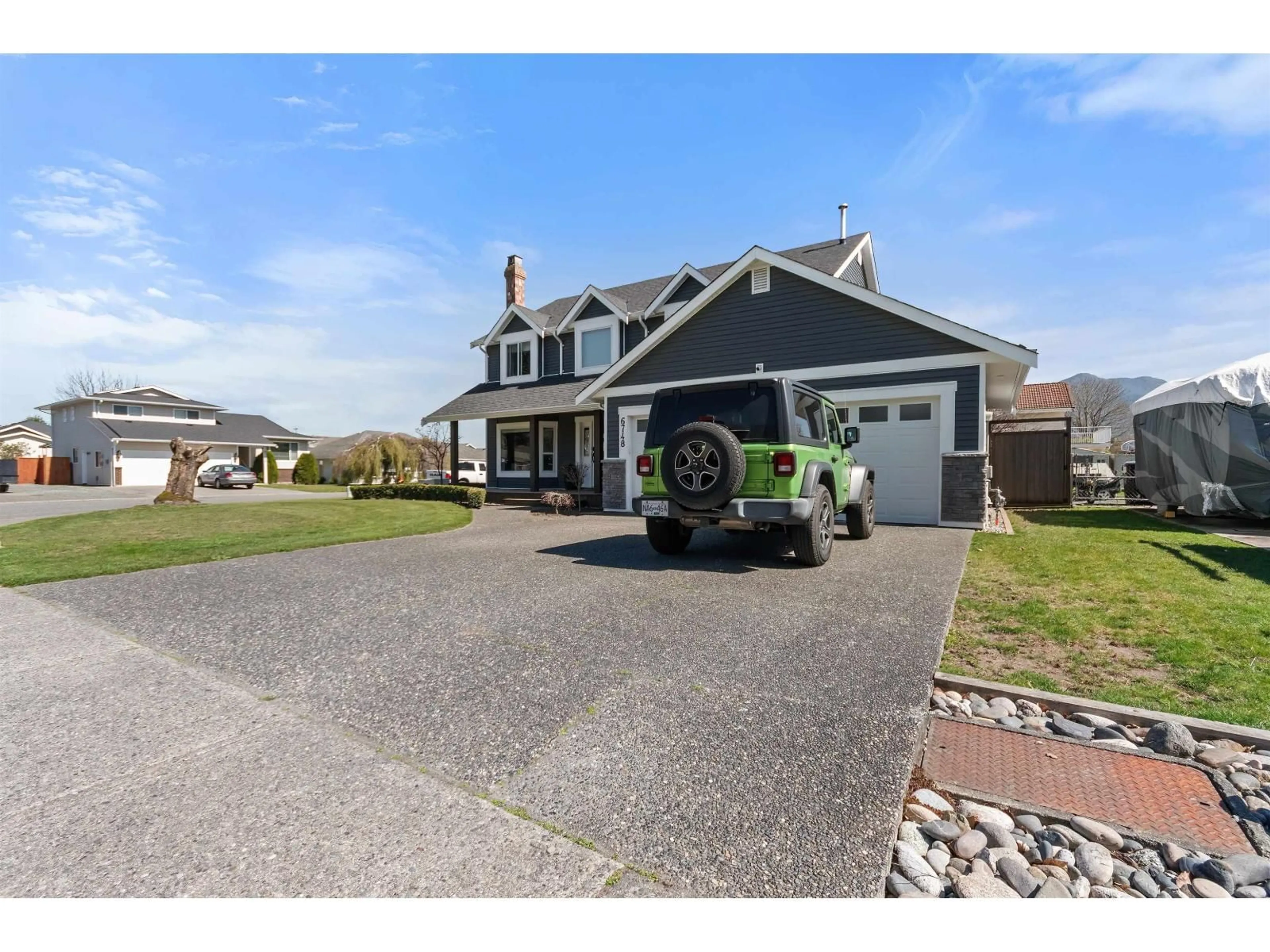 Home with vinyl exterior material, street for 6748 HENRY STREET, Chilliwack British Columbia V2R2Z9