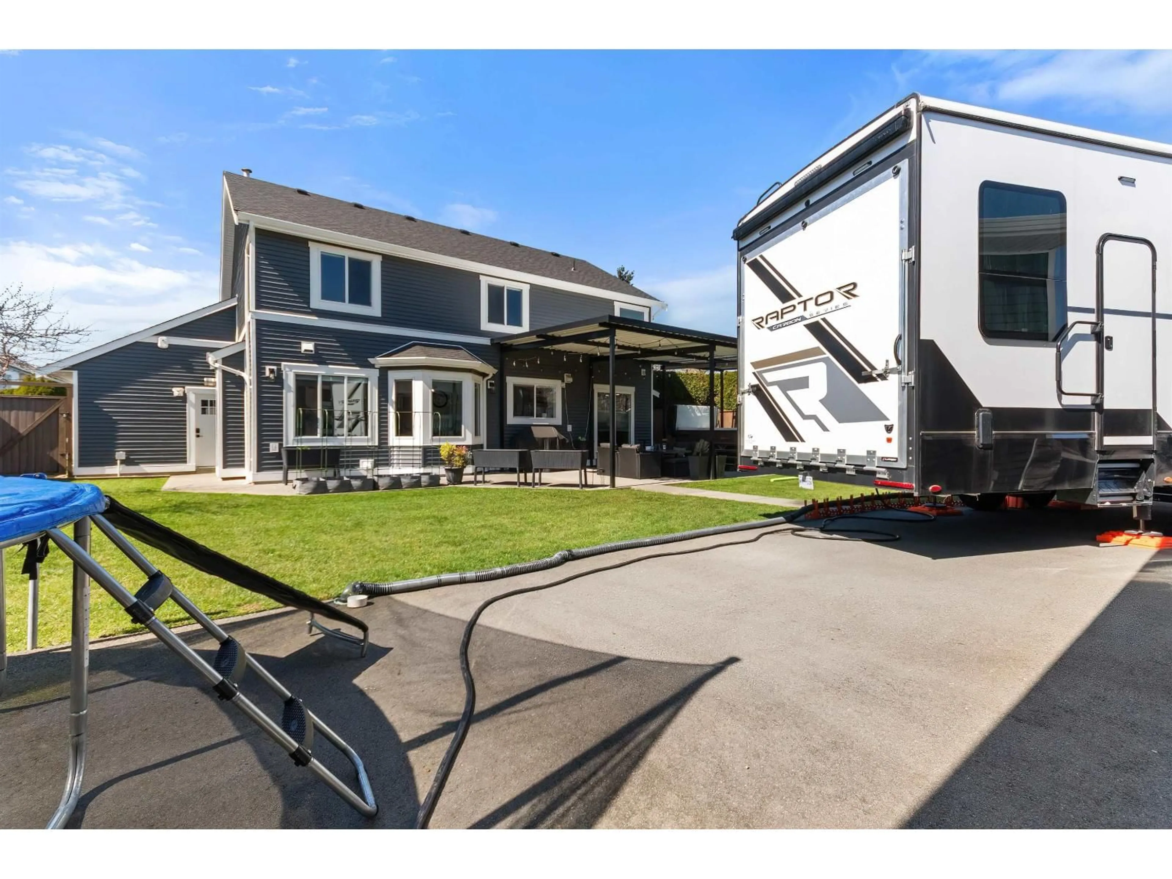 Home with vinyl exterior material, street for 6748 HENRY STREET, Chilliwack British Columbia V2R2Z9