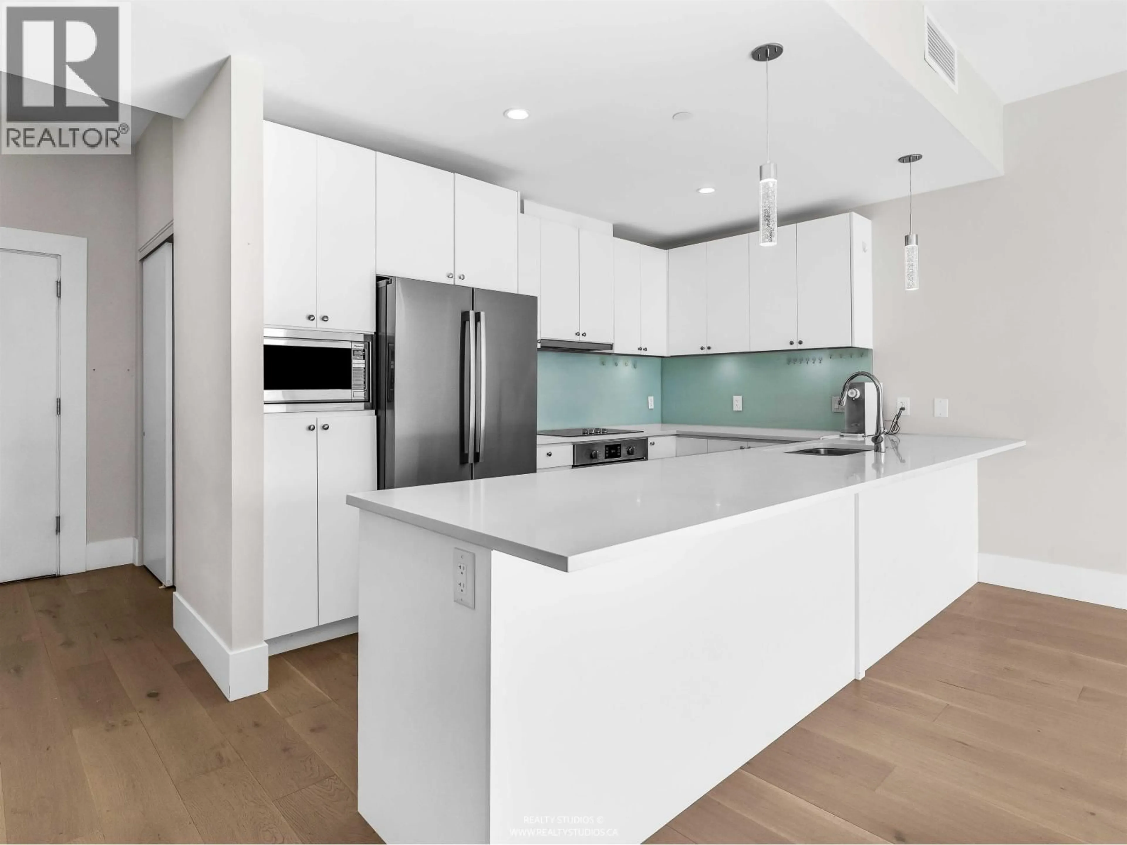 Open concept kitchen, unknown for 206 - 1591 BOWSER AVENUE, North Vancouver British Columbia V7P2Y4