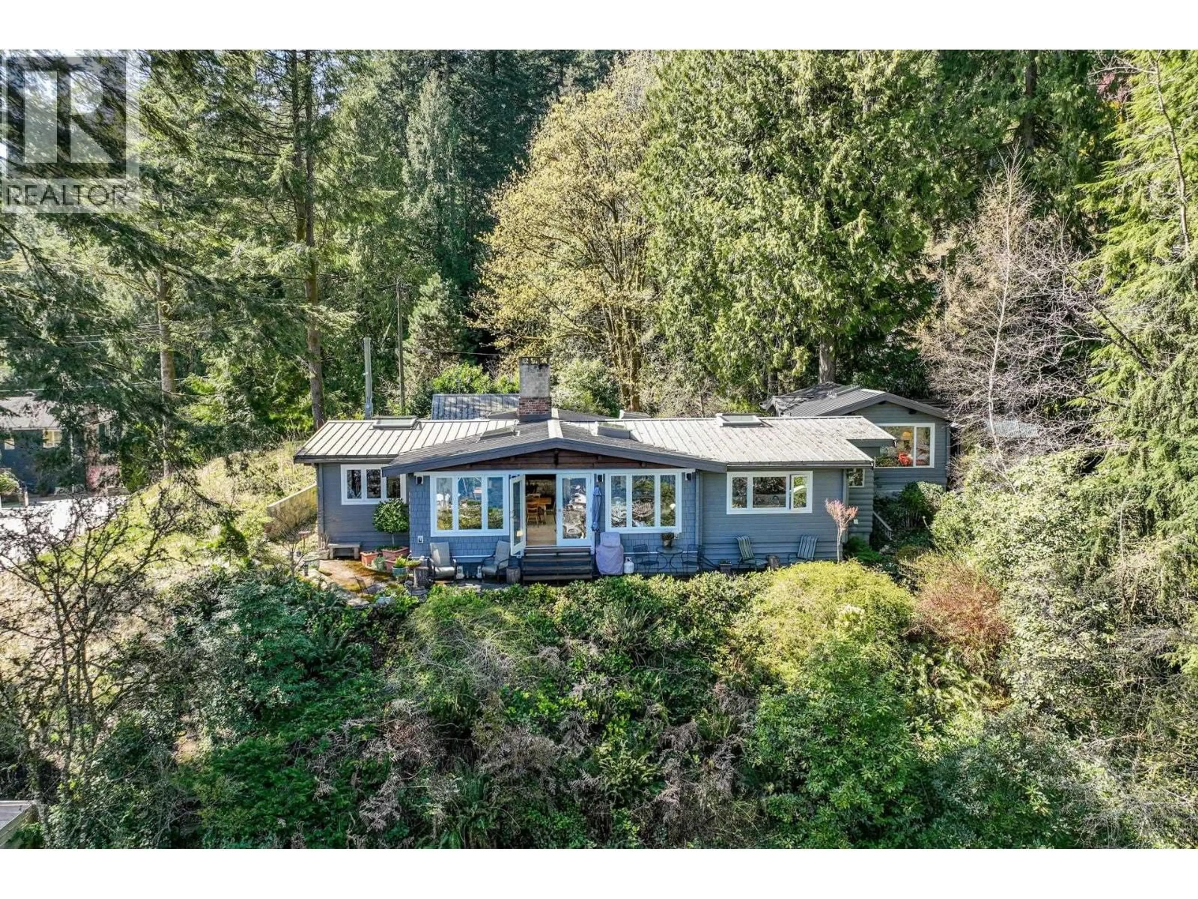A pic from outside/outdoor area/front of a property/back of a property/a pic from drone, water/lake/river/ocean view for 5457 INDIAN RIVER DRIVE, North Vancouver British Columbia V7G2T7