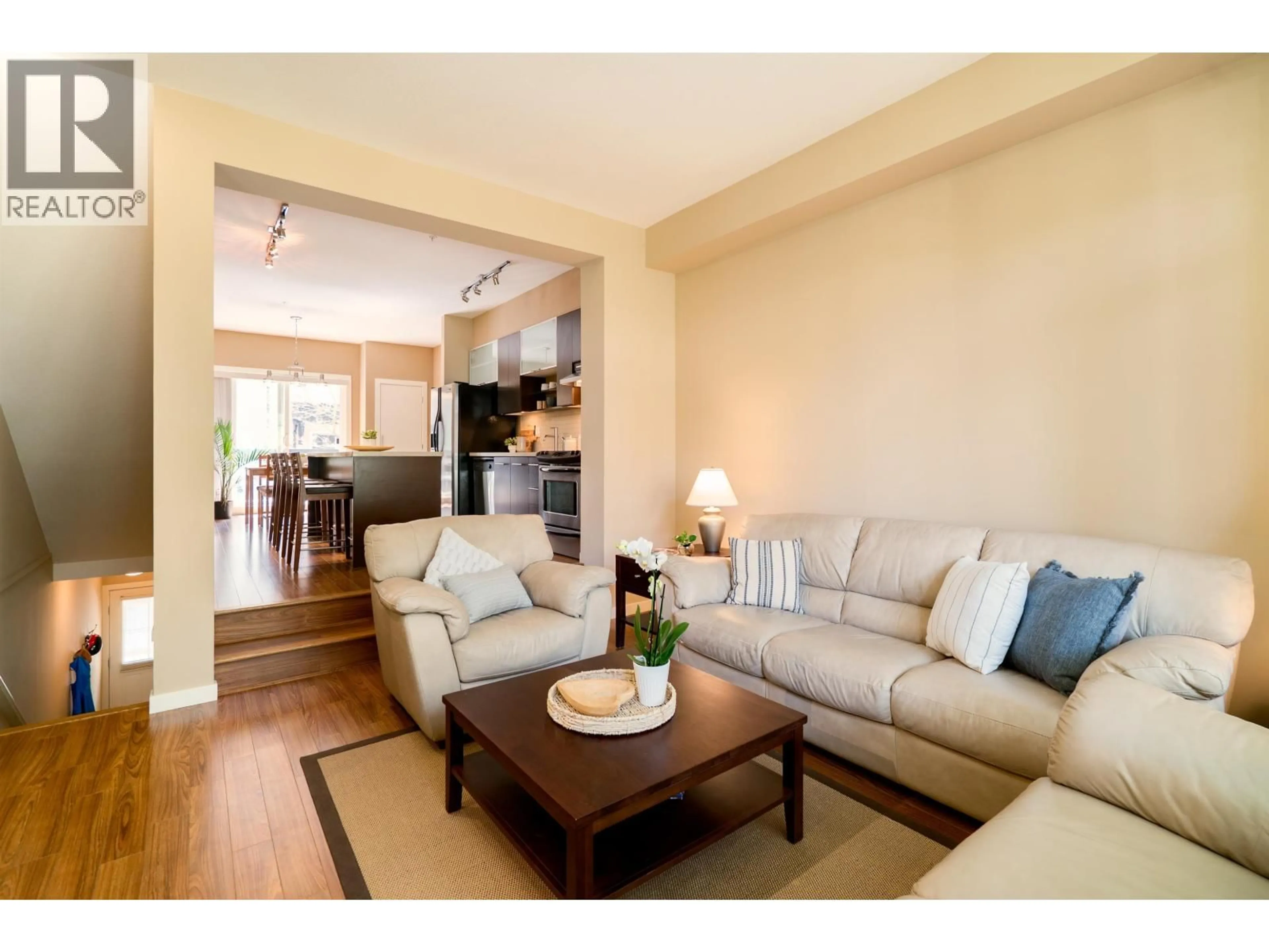 Living room with furniture, wood/laminate floor for 32 - 550 BROWNING PLACE, North Vancouver British Columbia V7H3A9