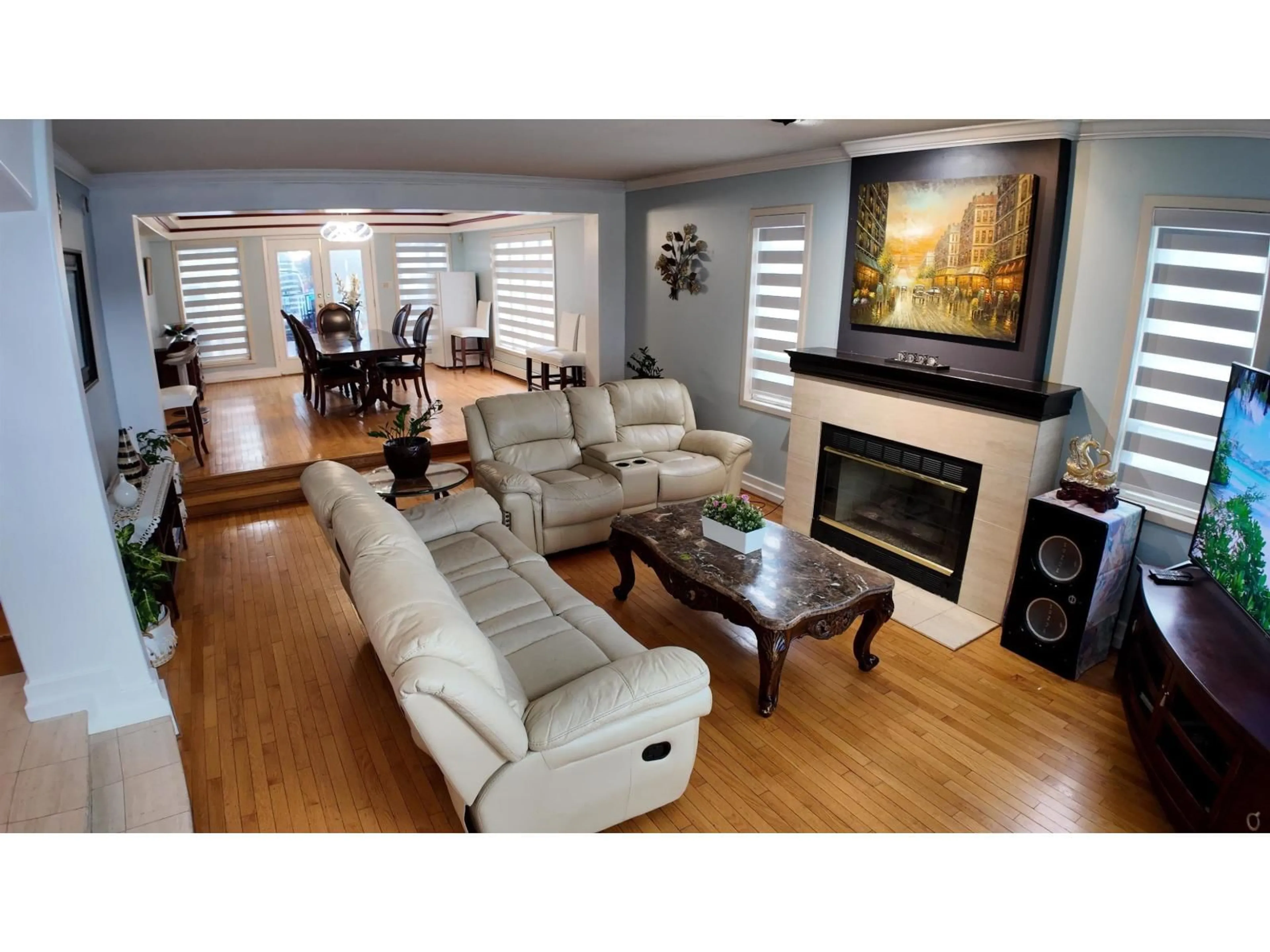 Living room with furniture, wood/laminate floor for 8222 144 STREET, Surrey British Columbia V3W5T4