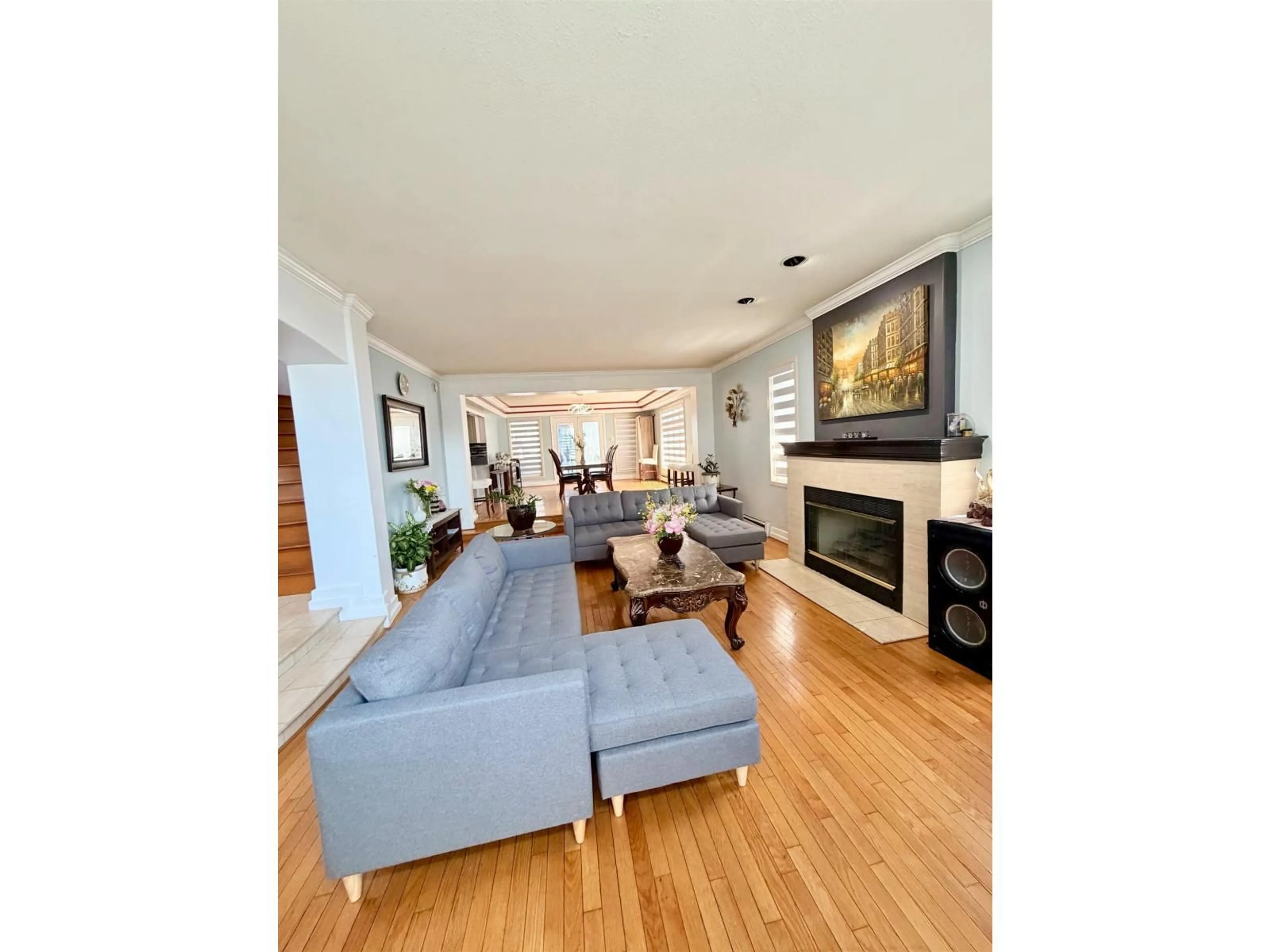 Living room with furniture, wood/laminate floor for 8222 144 STREET, Surrey British Columbia V3W5T4