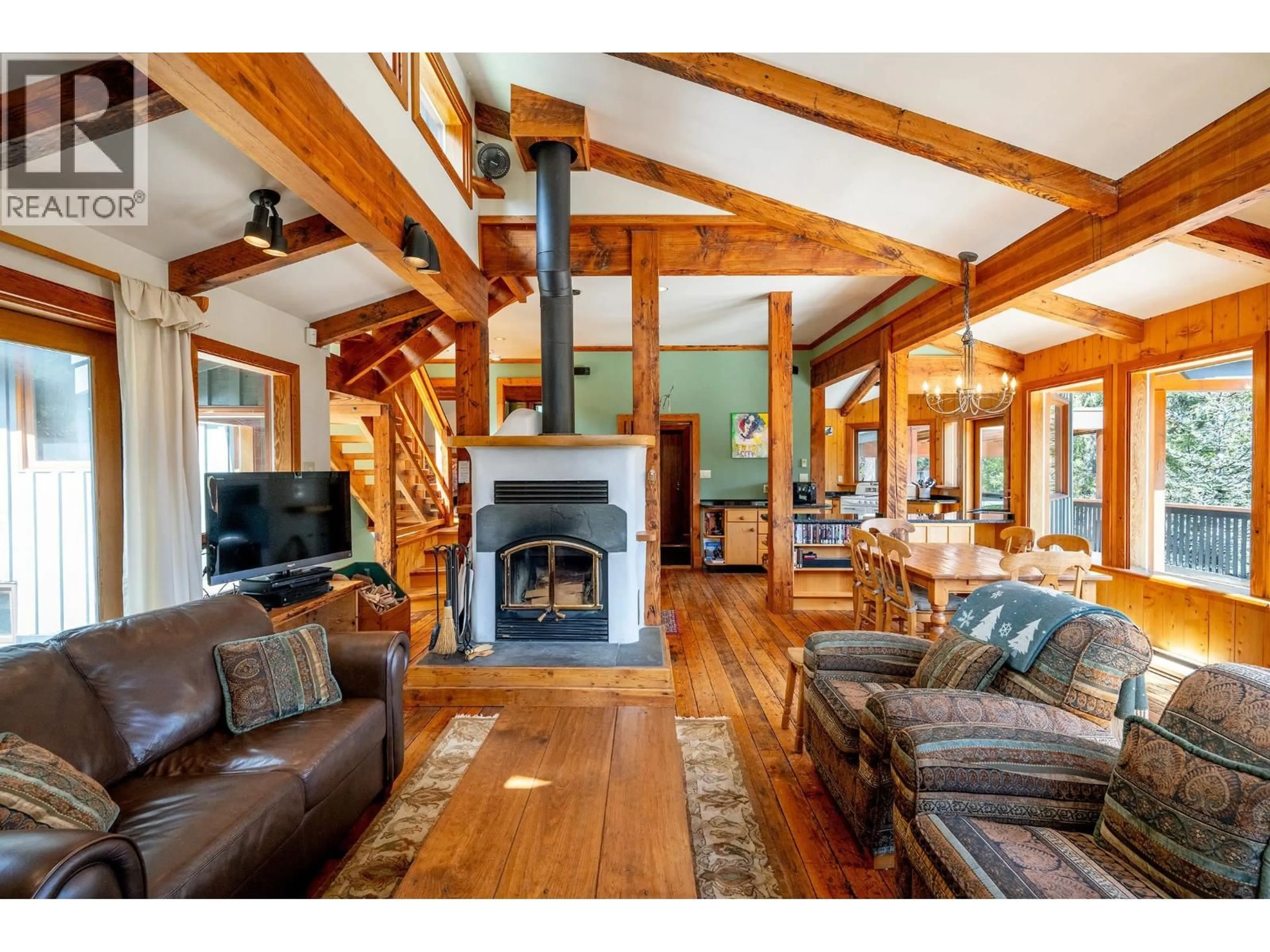 Living room with furniture, wood/laminate floor for 8596 DRIFTER PLACE, Whistler British Columbia V8E0G2