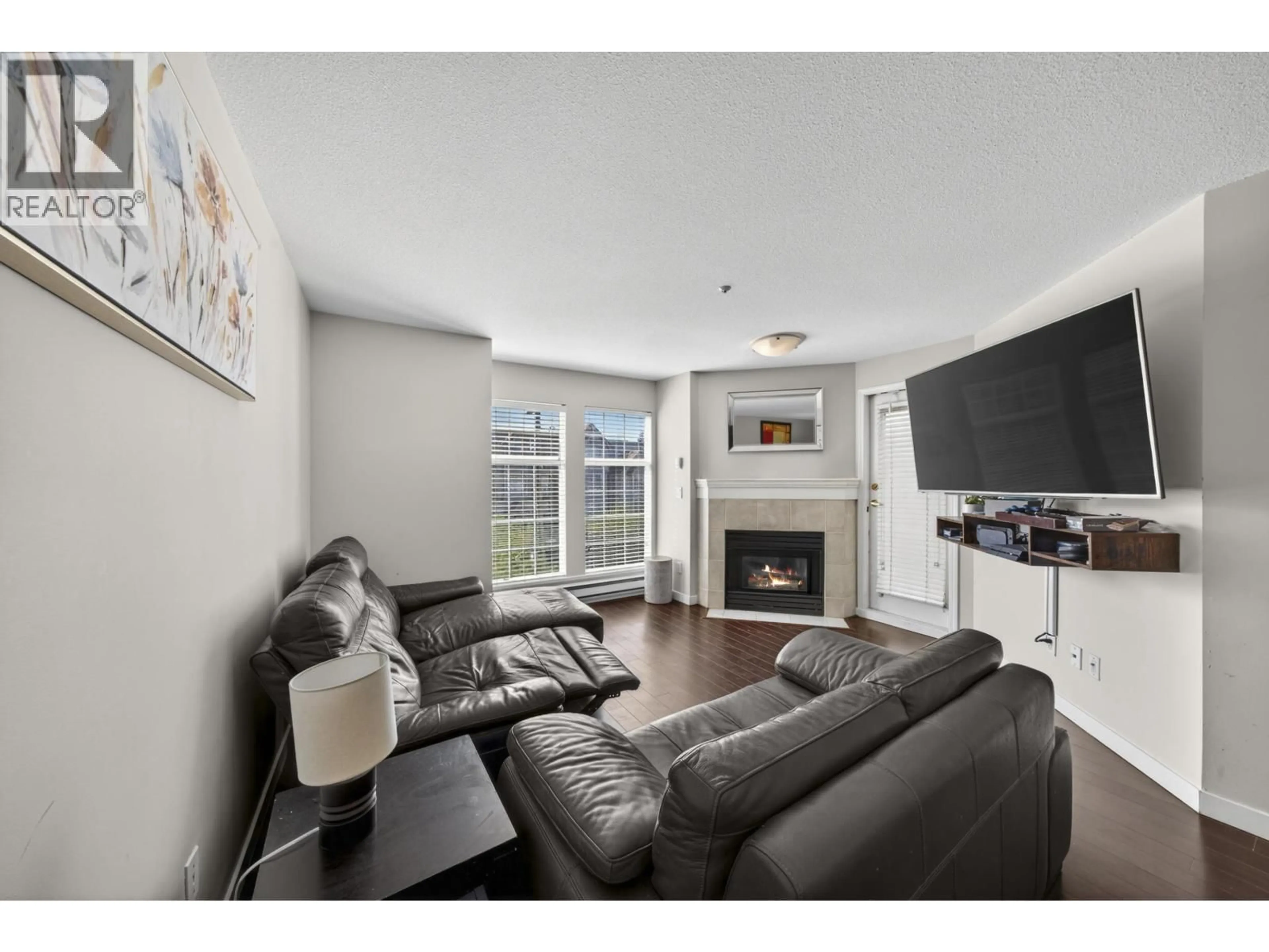 Living room with furniture, unknown for 312 - 1655 GRANT AVENUE, Port Coquitlam British Columbia V3B7V1