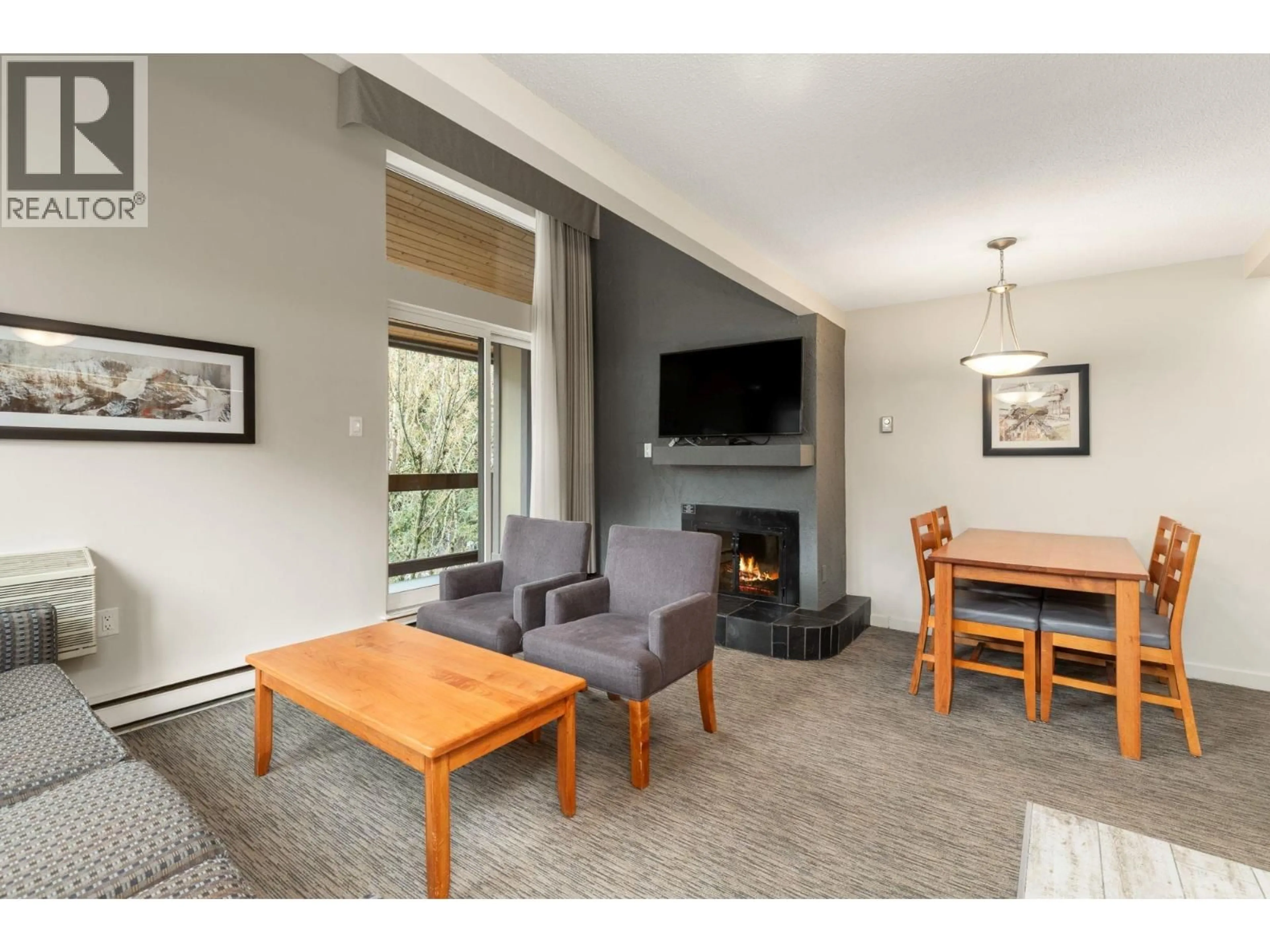 Living room with furniture, unknown for 310 - 4420 SUNDIAL PLACE, Whistler British Columbia V8E1G6