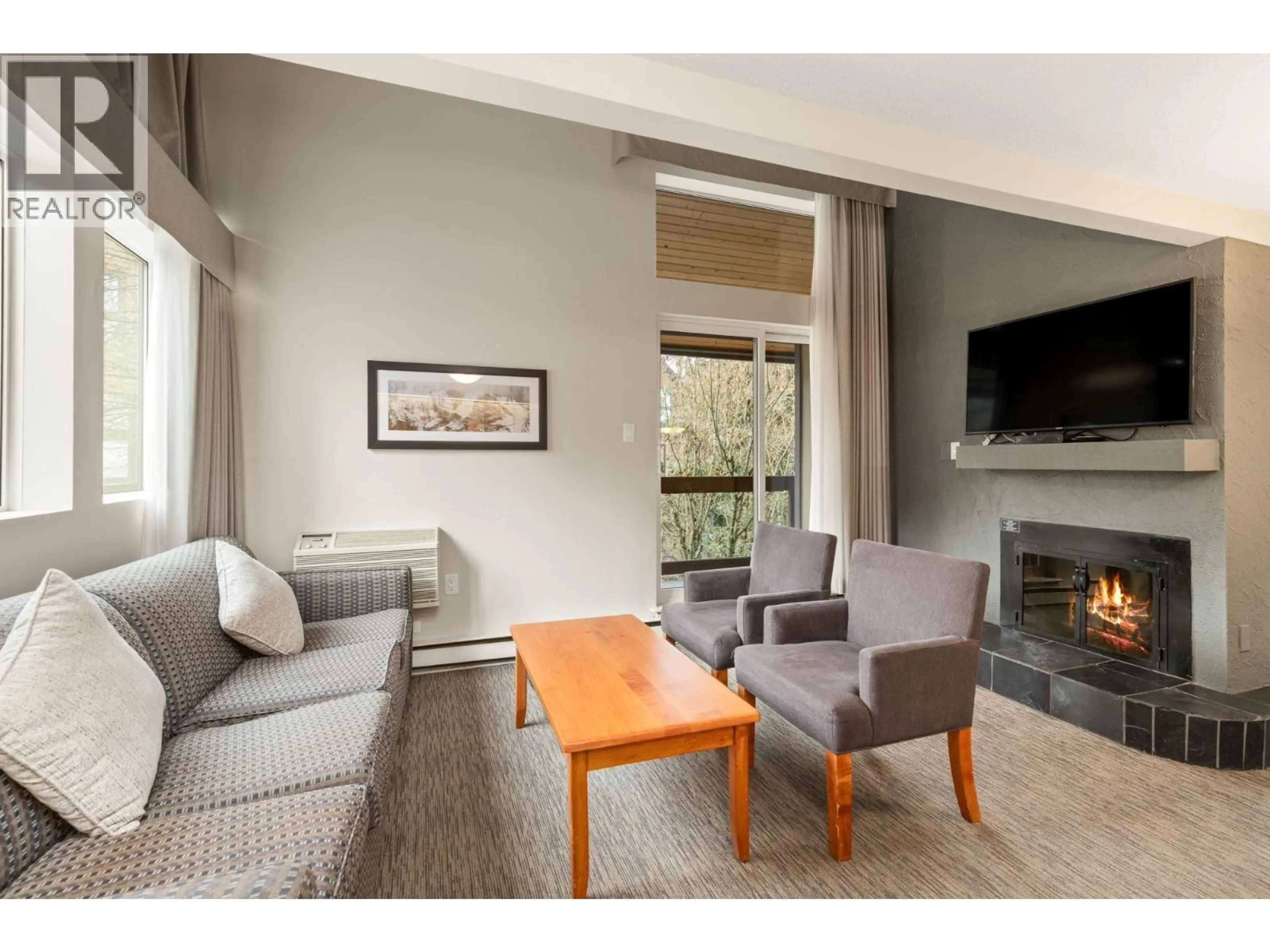 Living room with furniture, unknown for 310 - 4420 SUNDIAL PLACE, Whistler British Columbia V8E1G6