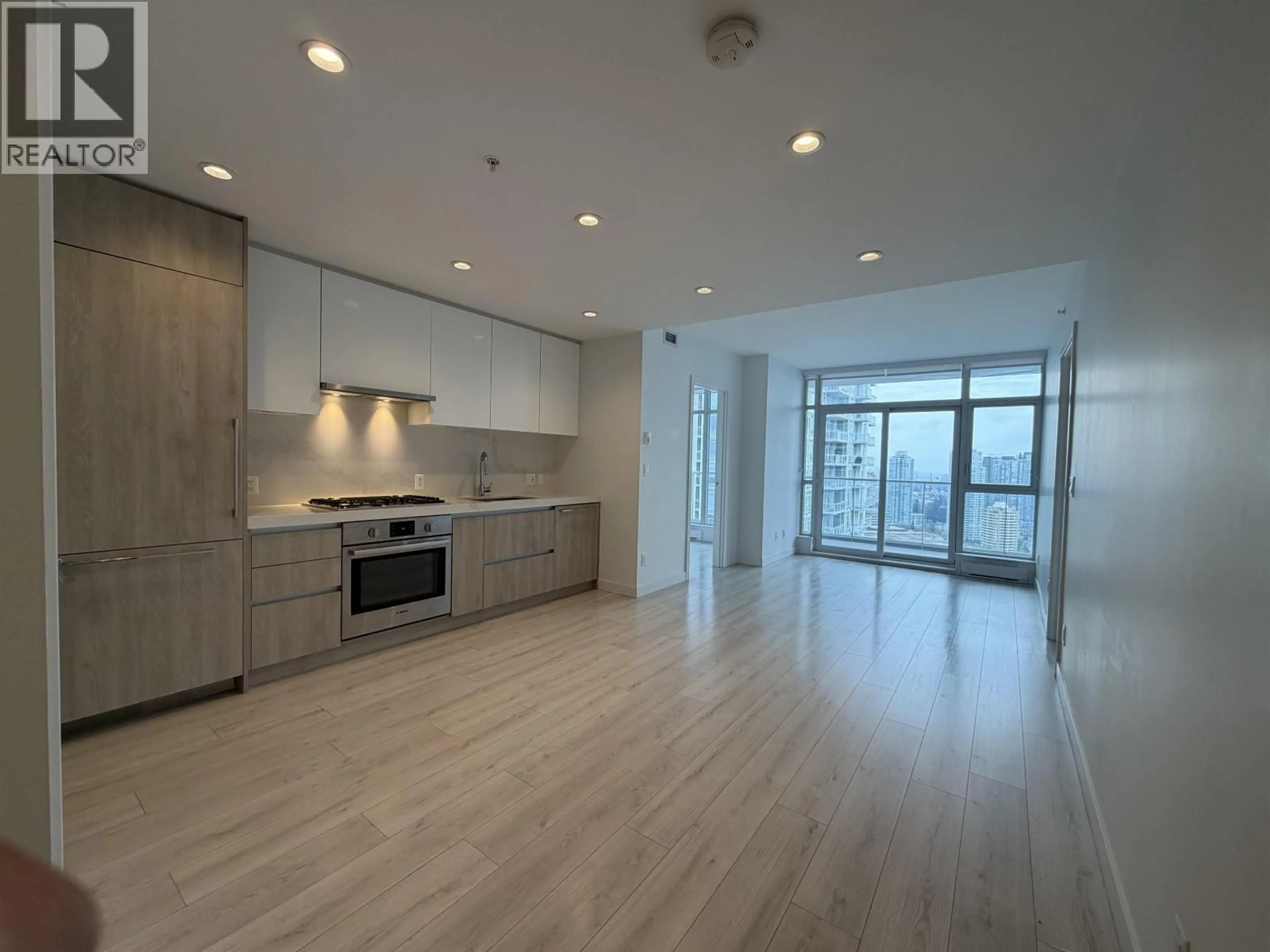 Open concept kitchen, wood/laminate floor for 3008 - 6080 MCKAY AVENUE, Burnaby British Columbia V5H0J4