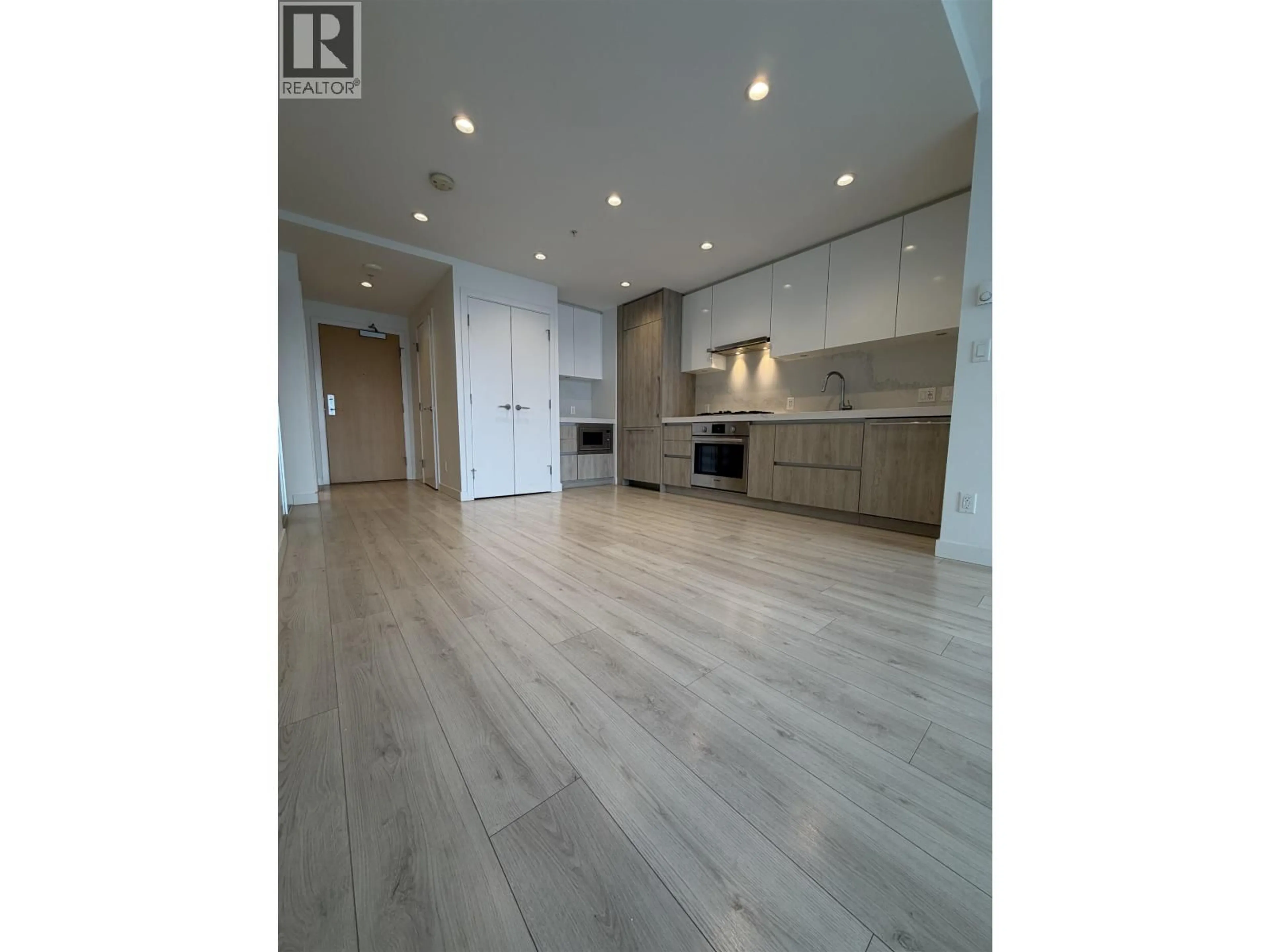 Open concept kitchen, wood/laminate floor for 3008 - 6080 MCKAY AVENUE, Burnaby British Columbia V5H0J4