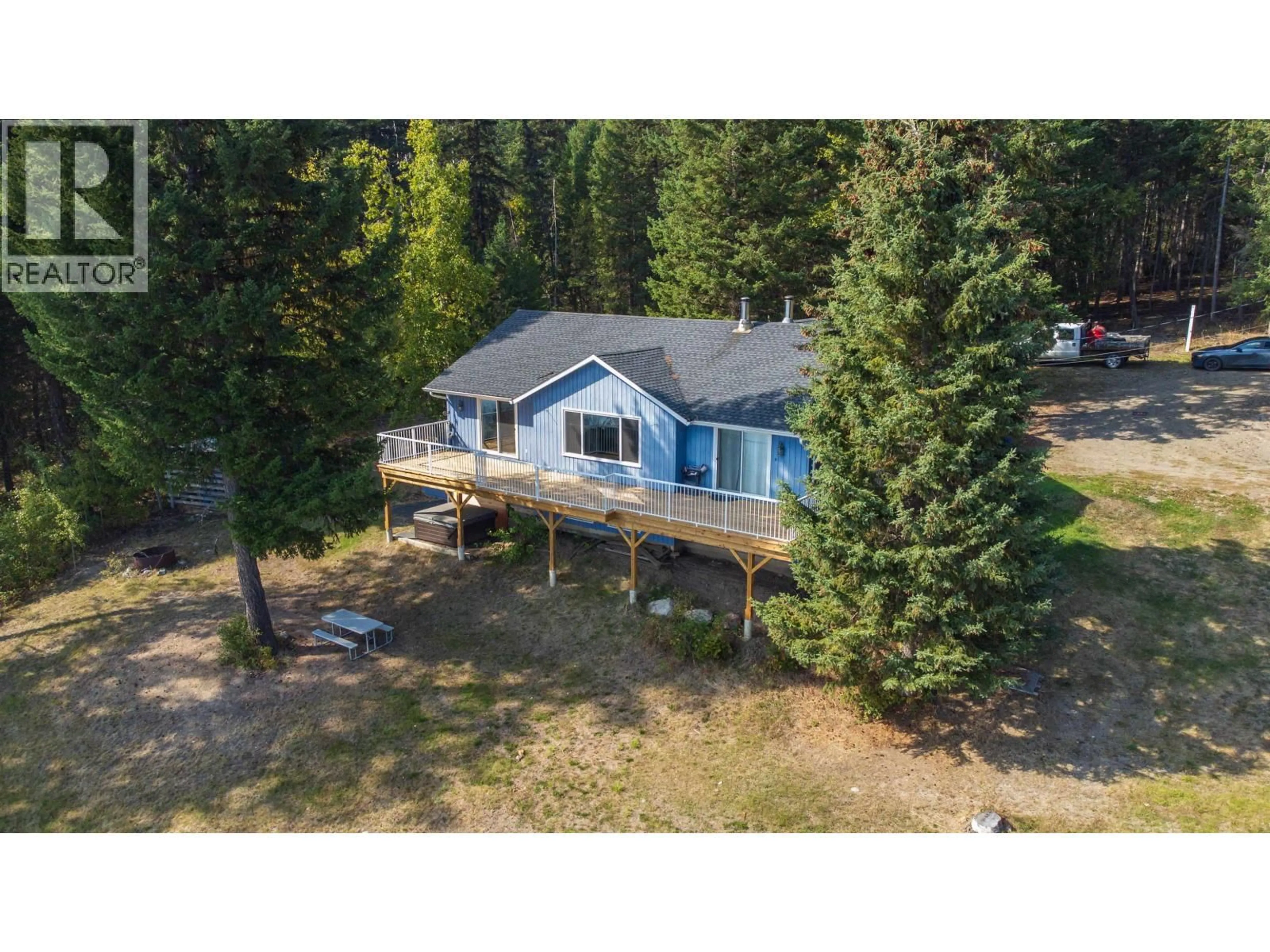 A pic from outside/outdoor area/front of a property/back of a property/a pic from drone, water/lake/river/ocean view for 2496 BIG LAKE-TYEE LAKE ROAD, Williams Lake British Columbia V2G4Y9