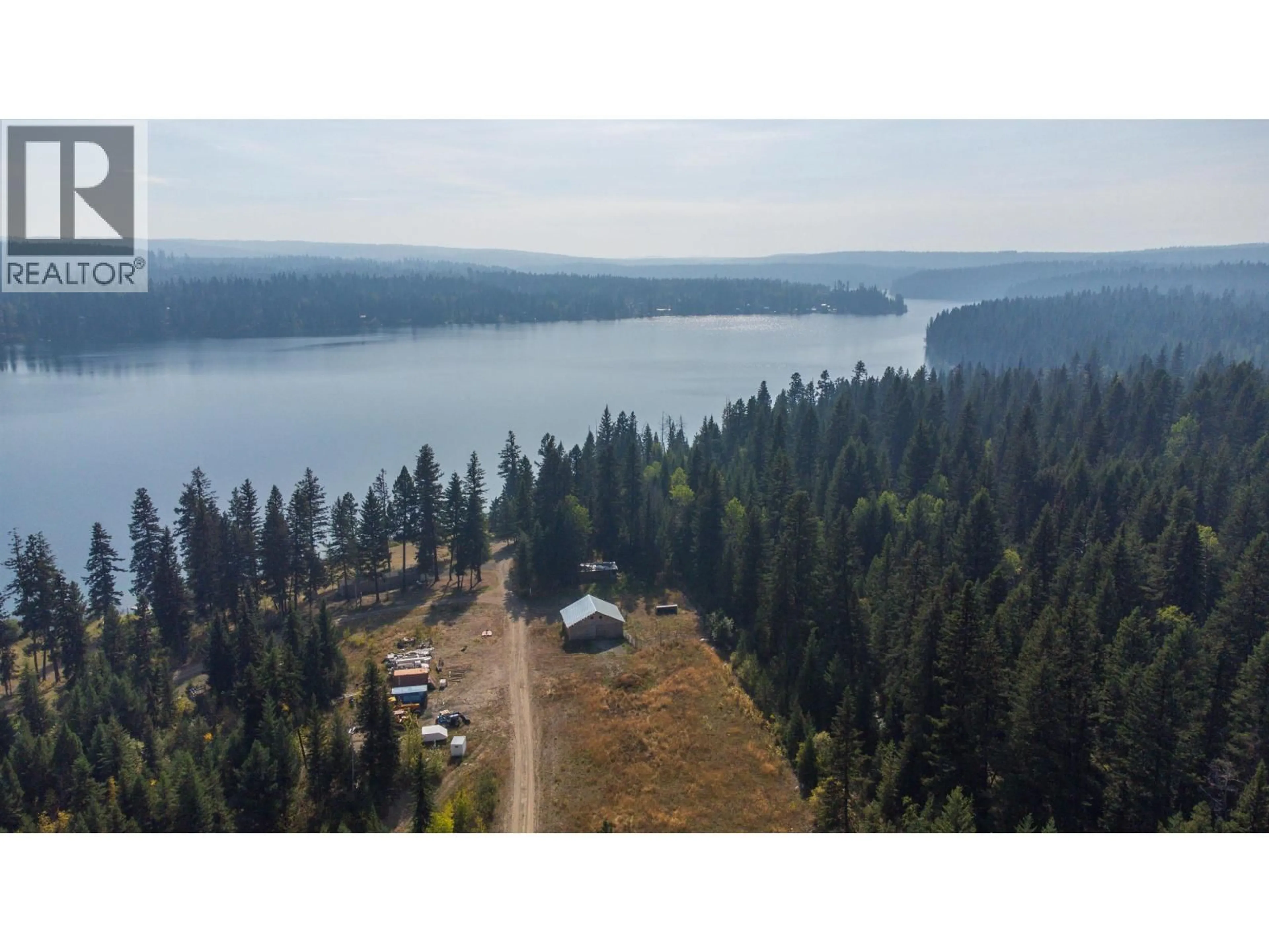 A pic from outside/outdoor area/front of a property/back of a property/a pic from drone, water/lake/river/ocean view for 2496 BIG LAKE-TYEE LAKE ROAD, Williams Lake British Columbia V2G4Y9