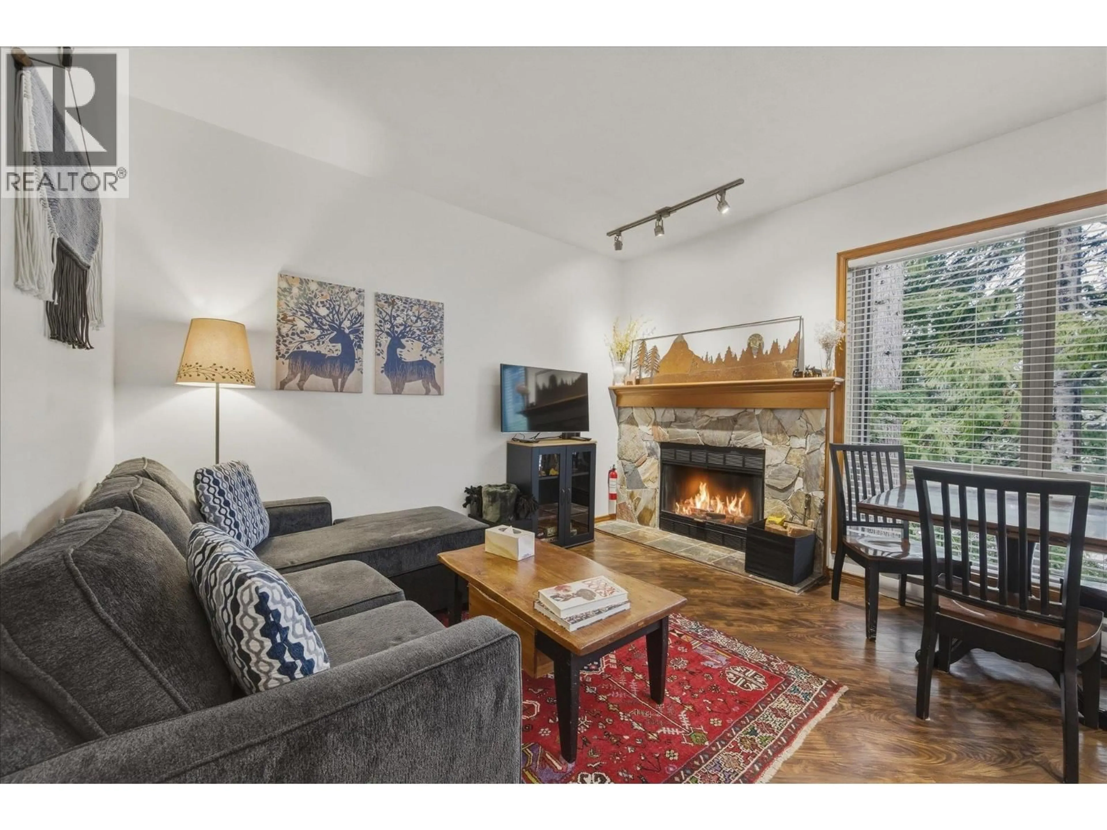 Living room with furniture, wood/laminate floor for 8 - 4891 PAINTED CLIFF ROAD, Whistler British Columbia V0N1B4