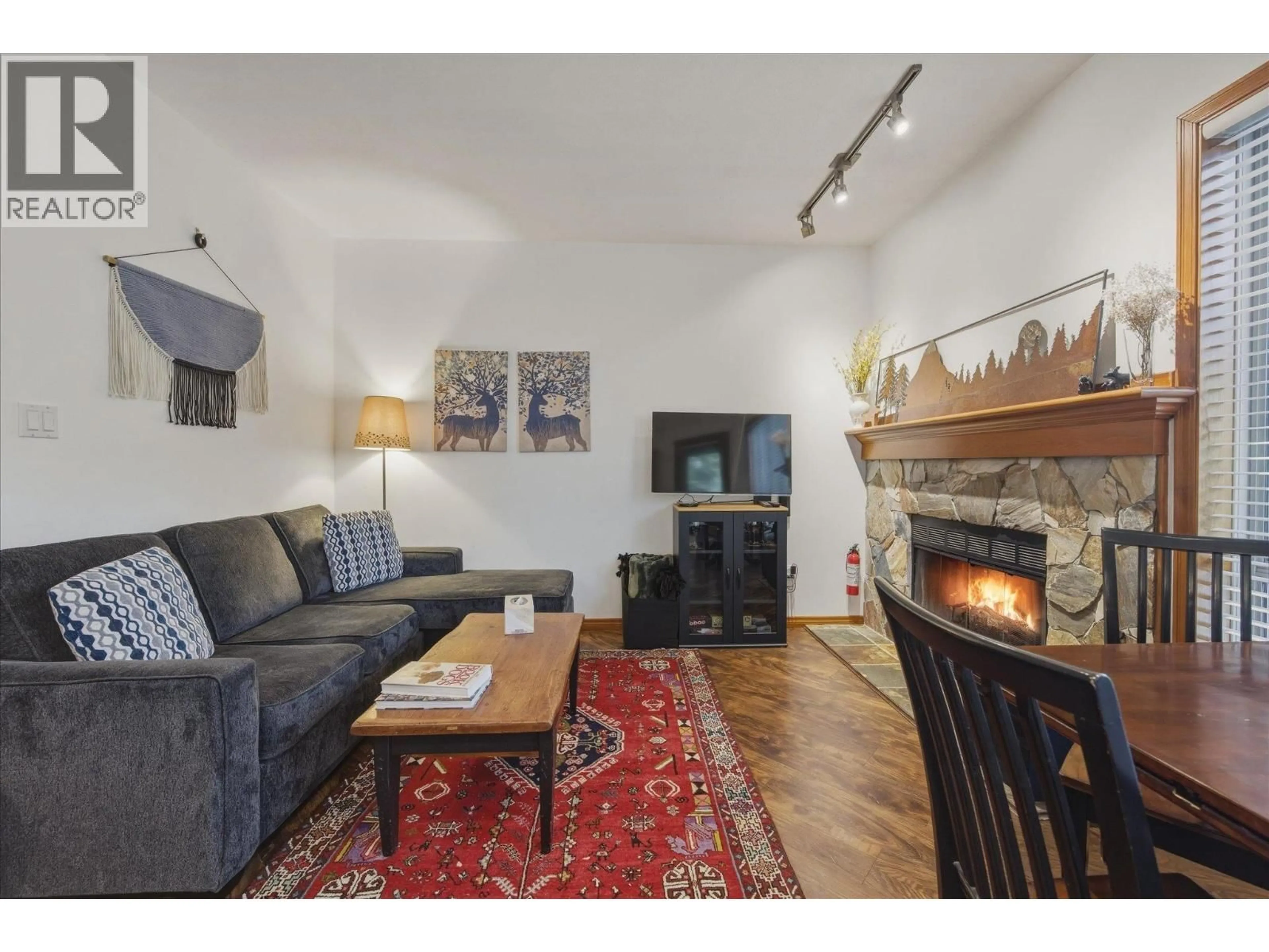 Living room with furniture, wood/laminate floor for 8 - 4891 PAINTED CLIFF ROAD, Whistler British Columbia V0N1B4