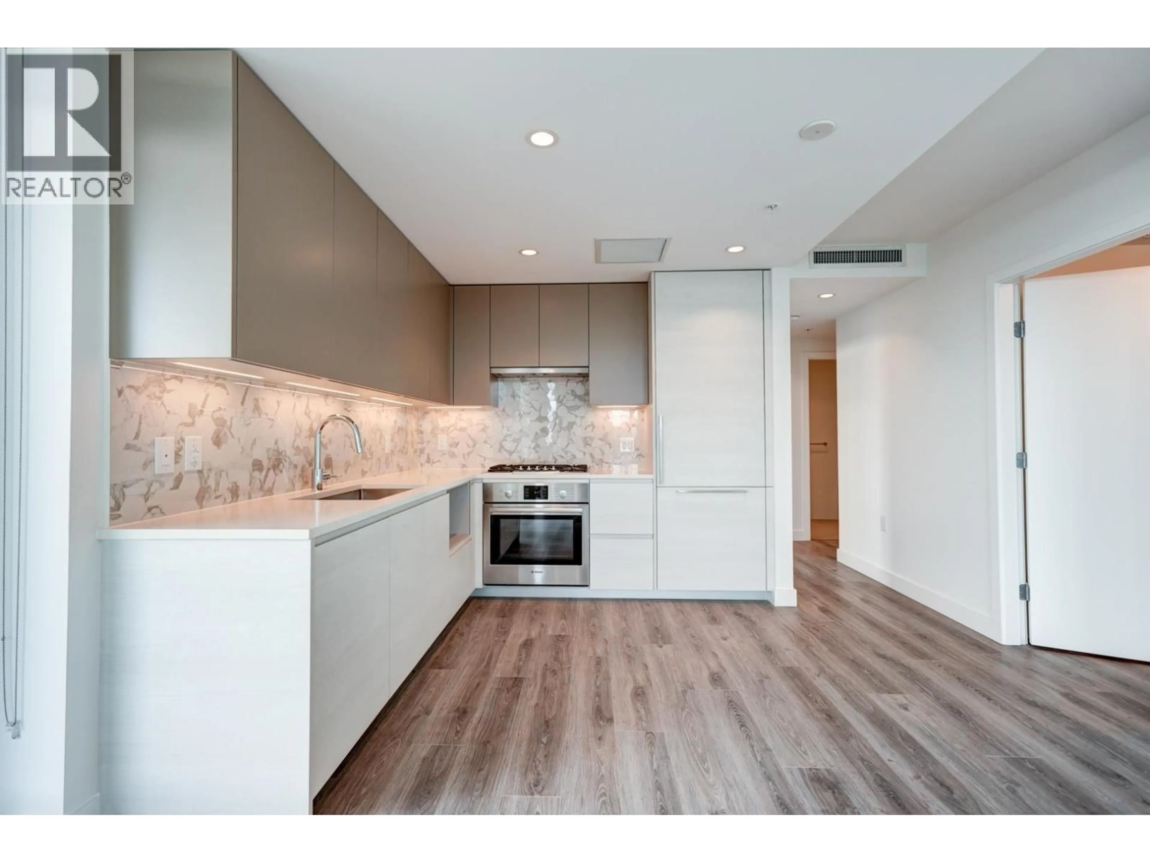 Open concept kitchen, unknown for 1502 - 8188 FRASER STREET, Vancouver British Columbia V5X0J8
