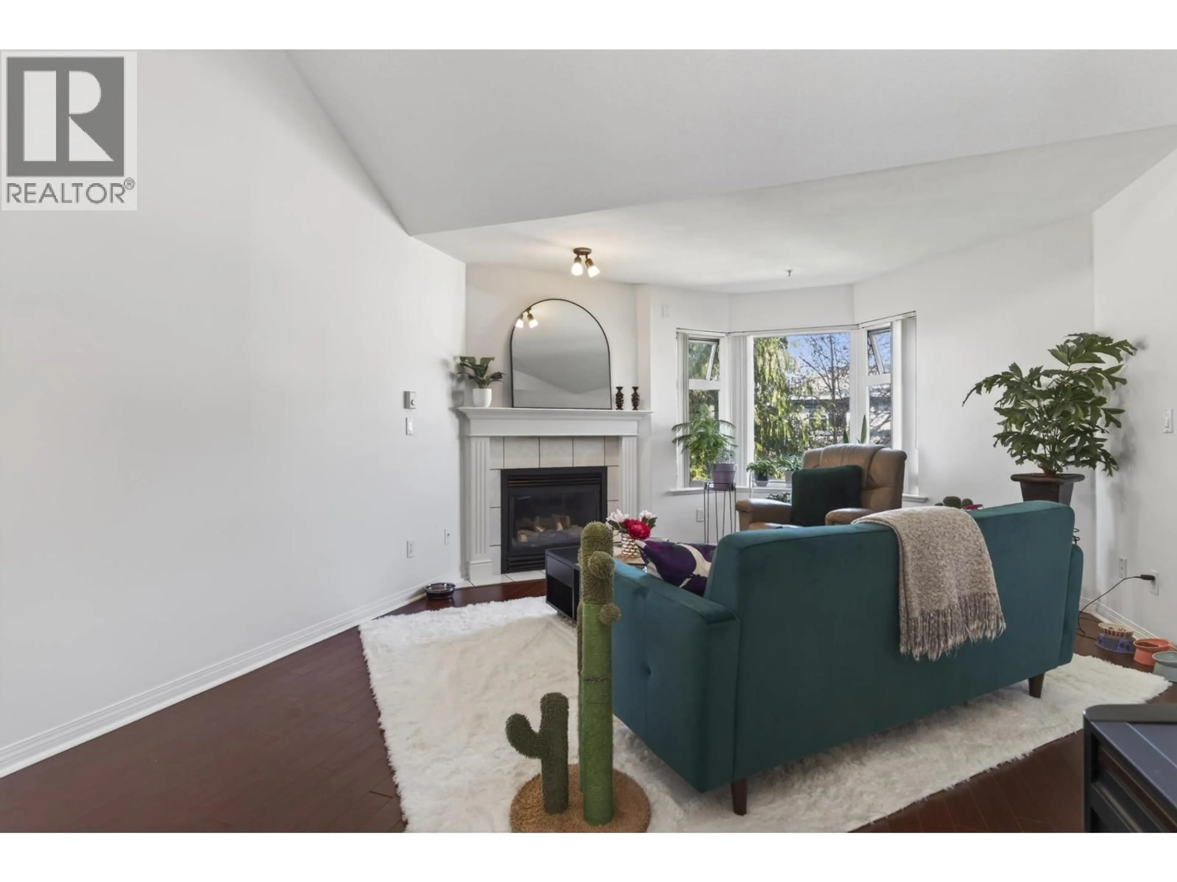 Living room with furniture, unknown for 306 - 1999 SUFFOLK AVENUE, Port Coquitlam British Columbia V3B7X7