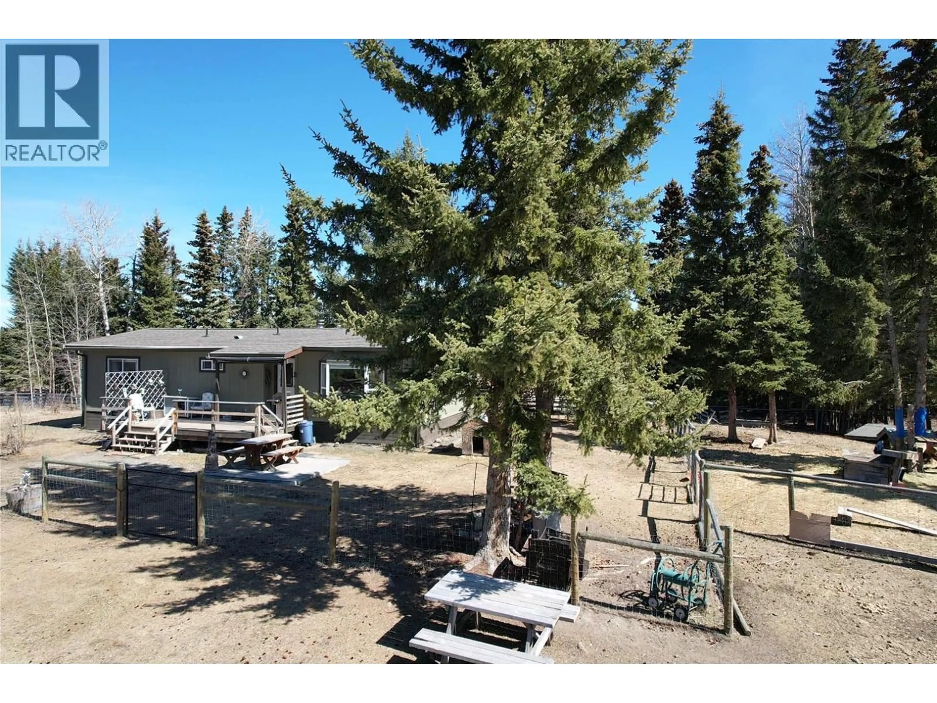 A pic from outside/outdoor area/front of a property/back of a property/a pic from drone, forest/trees view for 6982 INMAN ROAD, Lone Butte British Columbia V0K1X0