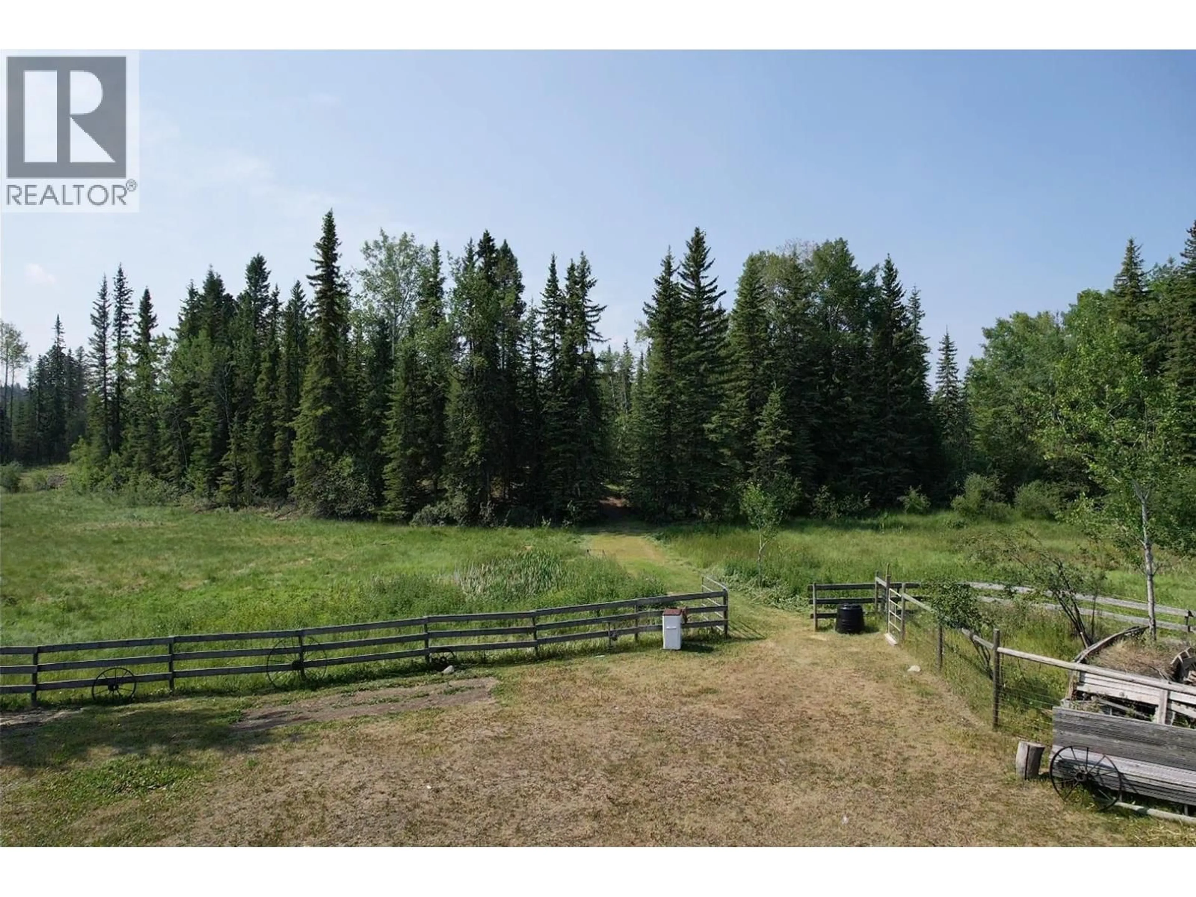A pic from outside/outdoor area/front of a property/back of a property/a pic from drone, forest/trees view for 6982 INMAN ROAD, Lone Butte British Columbia V0K1X0