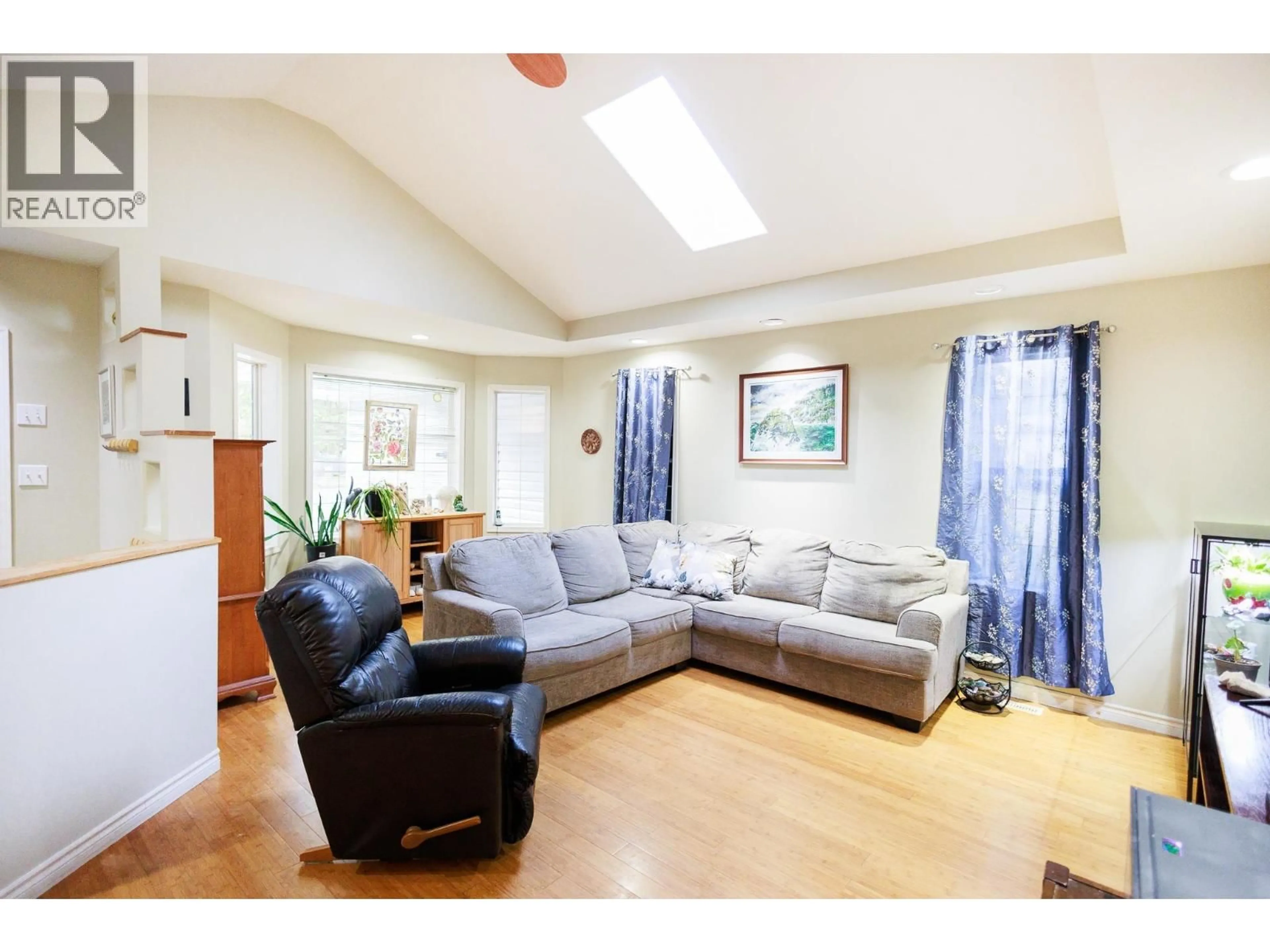 Living room with furniture, wood/laminate floor for 4674 MARTEN DRIVE, Terrace British Columbia V8G0A5