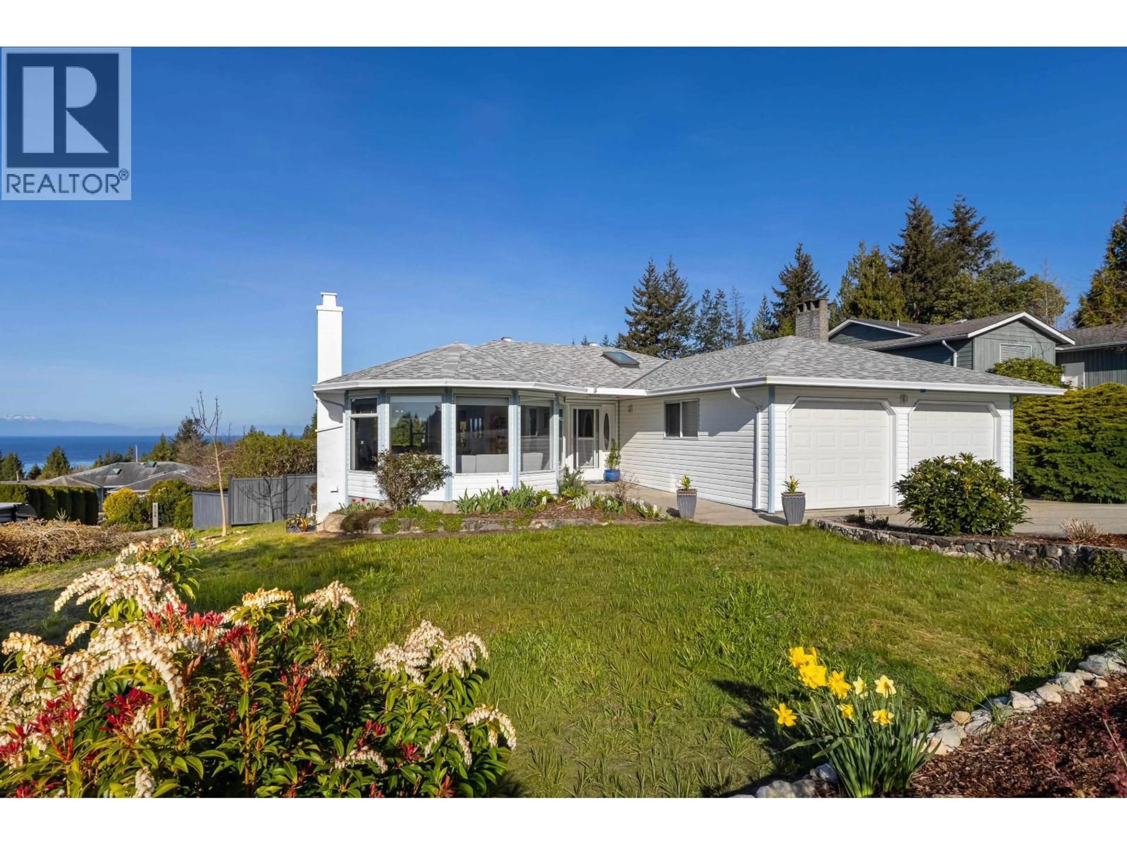 A pic from outside/outdoor area/front of a property/back of a property/a pic from drone, water/lake/river/ocean view for 5007 LAUREL AVENUE, Sechelt British Columbia V7Z0B9