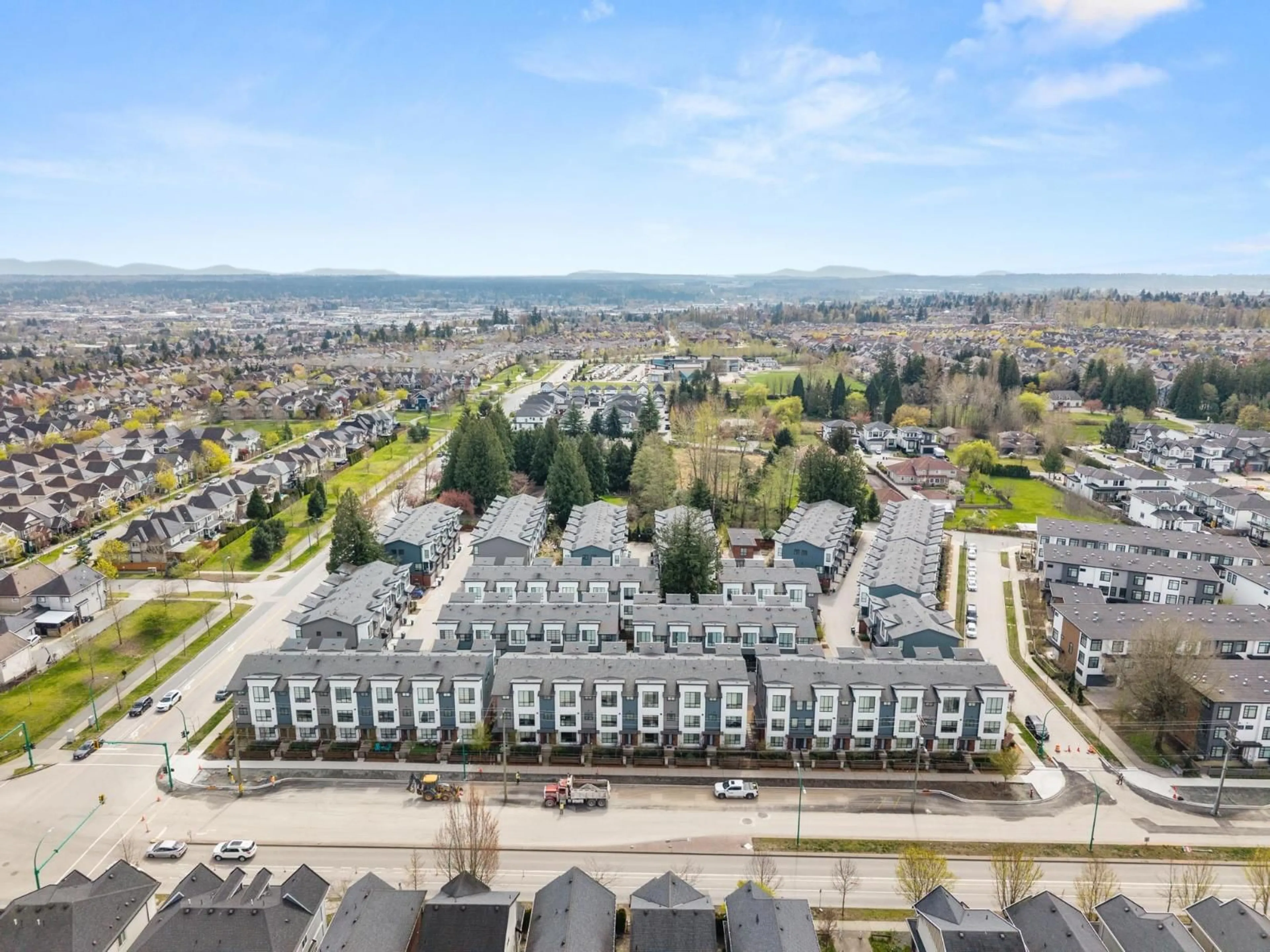 A pic from outside/outdoor area/front of a property/back of a property/a pic from drone, mountain view for 25 - 7177 194A STREET, Surrey British Columbia V4N6V6