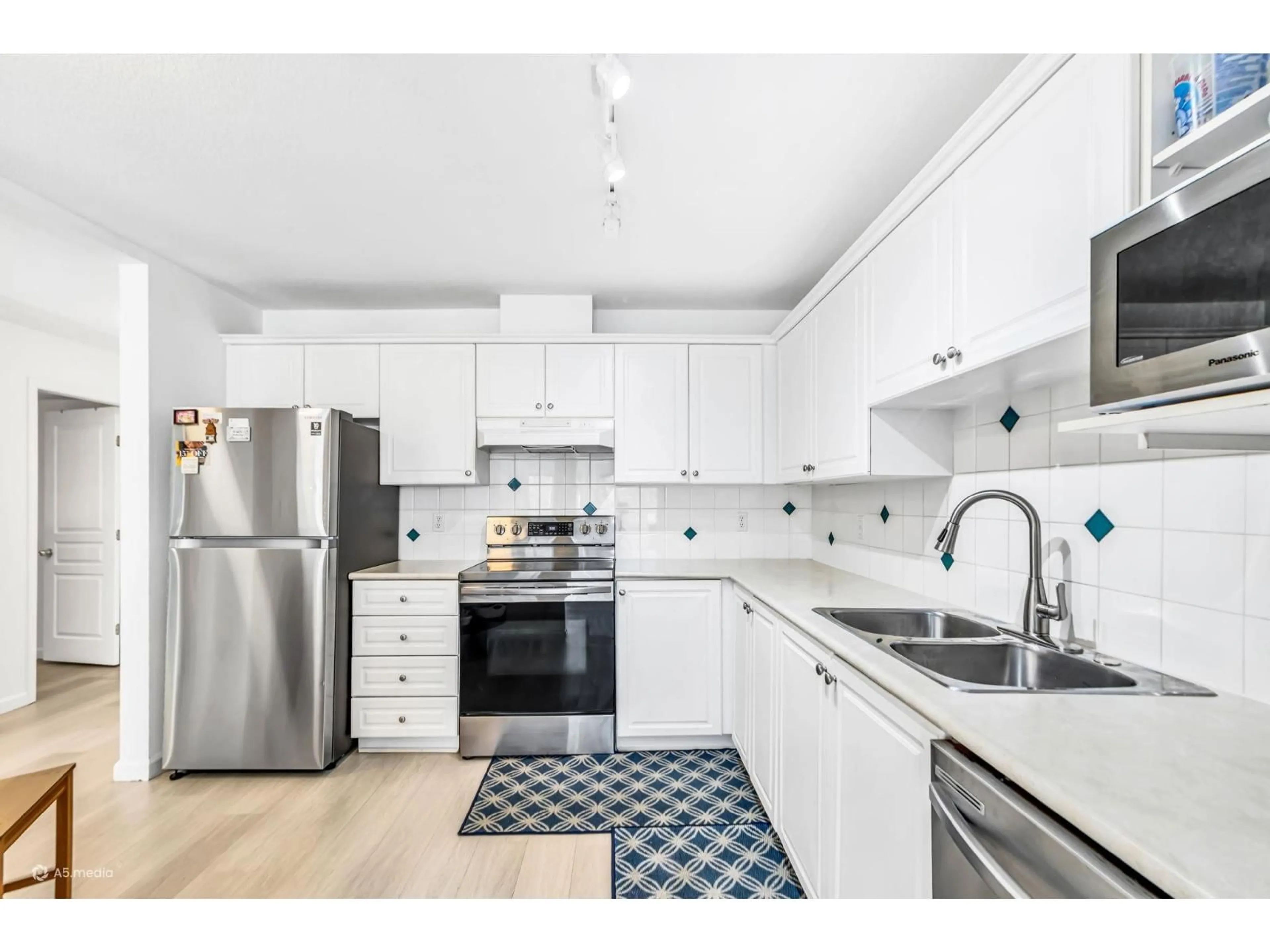Open concept kitchen, unknown for 303 - 8139 121A STREET, Surrey British Columbia V3W0Z2