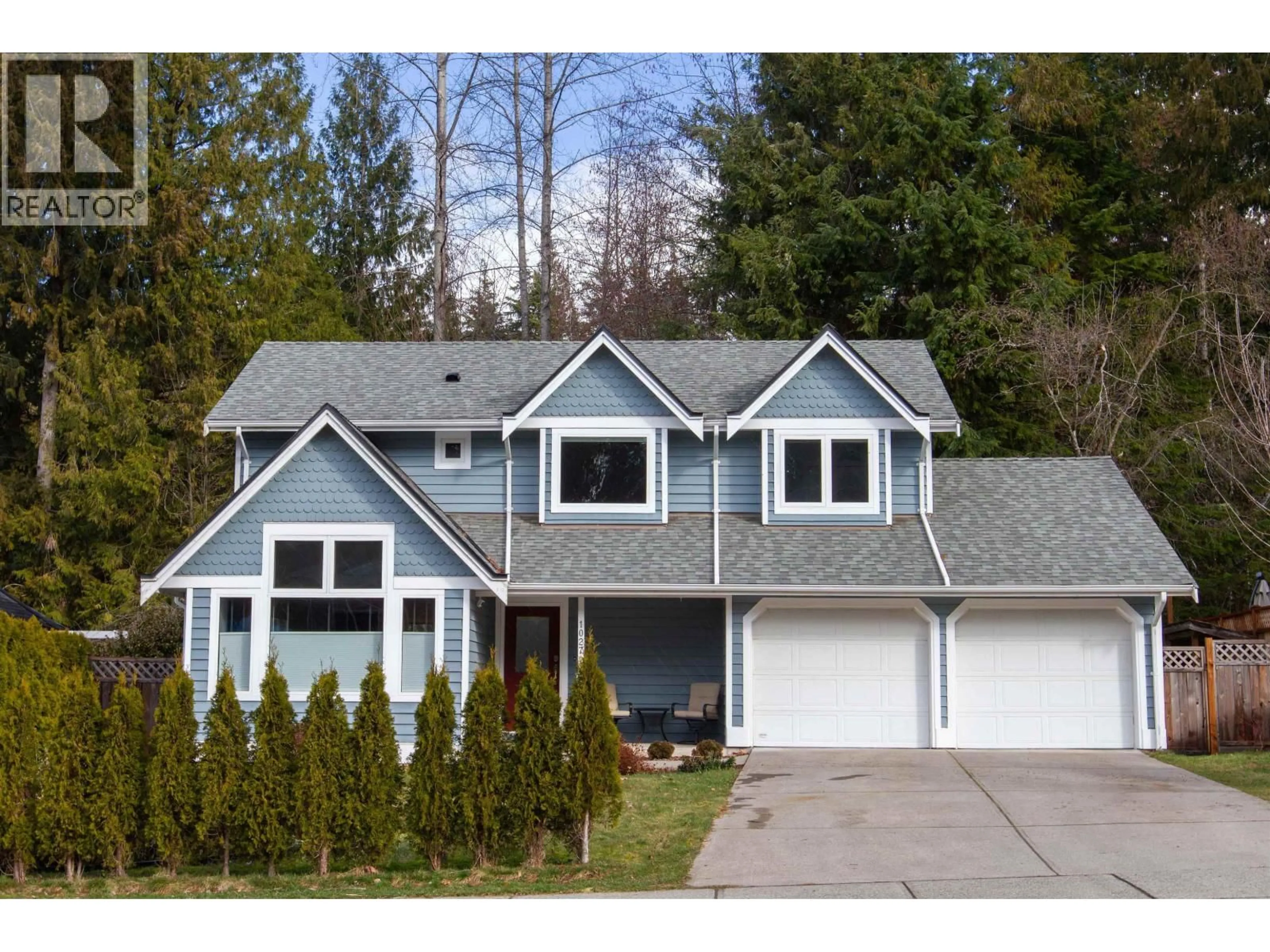 Home with vinyl exterior material, street for 1027 PIA ROAD, Squamish British Columbia V0N1T0