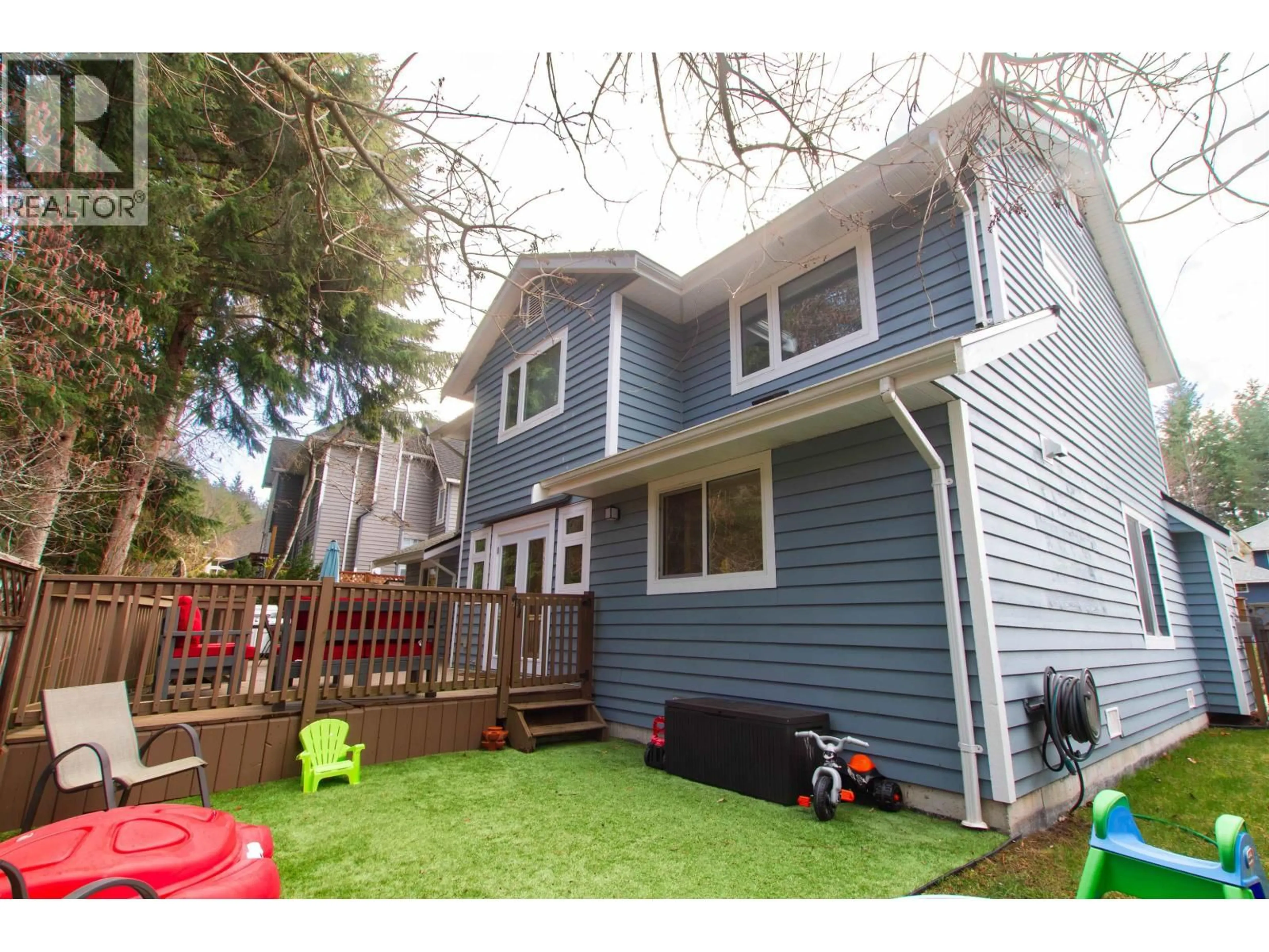 Home with vinyl exterior material, street for 1027 PIA ROAD, Squamish British Columbia V0N1T0