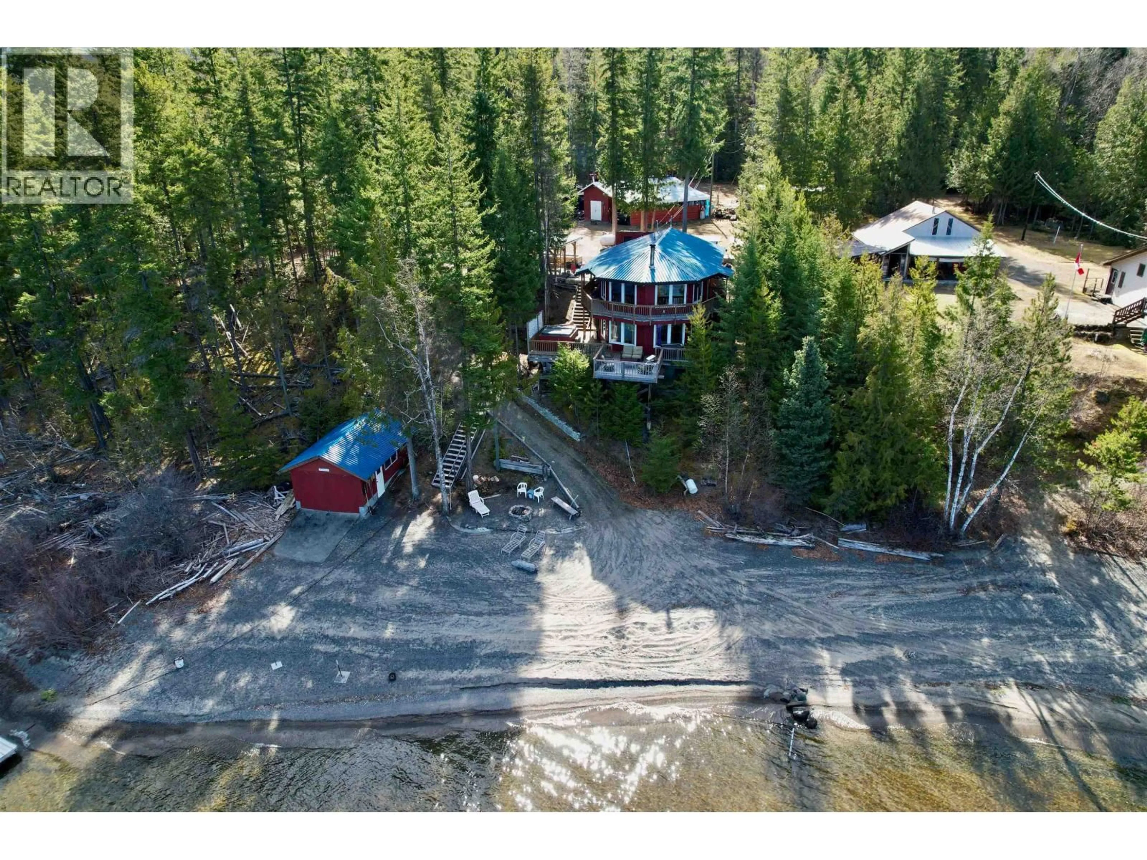 A pic from outside/outdoor area/front of a property/back of a property/a pic from drone, water/lake/river/ocean view for 9303 MAHOOD LAKE ROAD, Canim Lake British Columbia V0K1J0