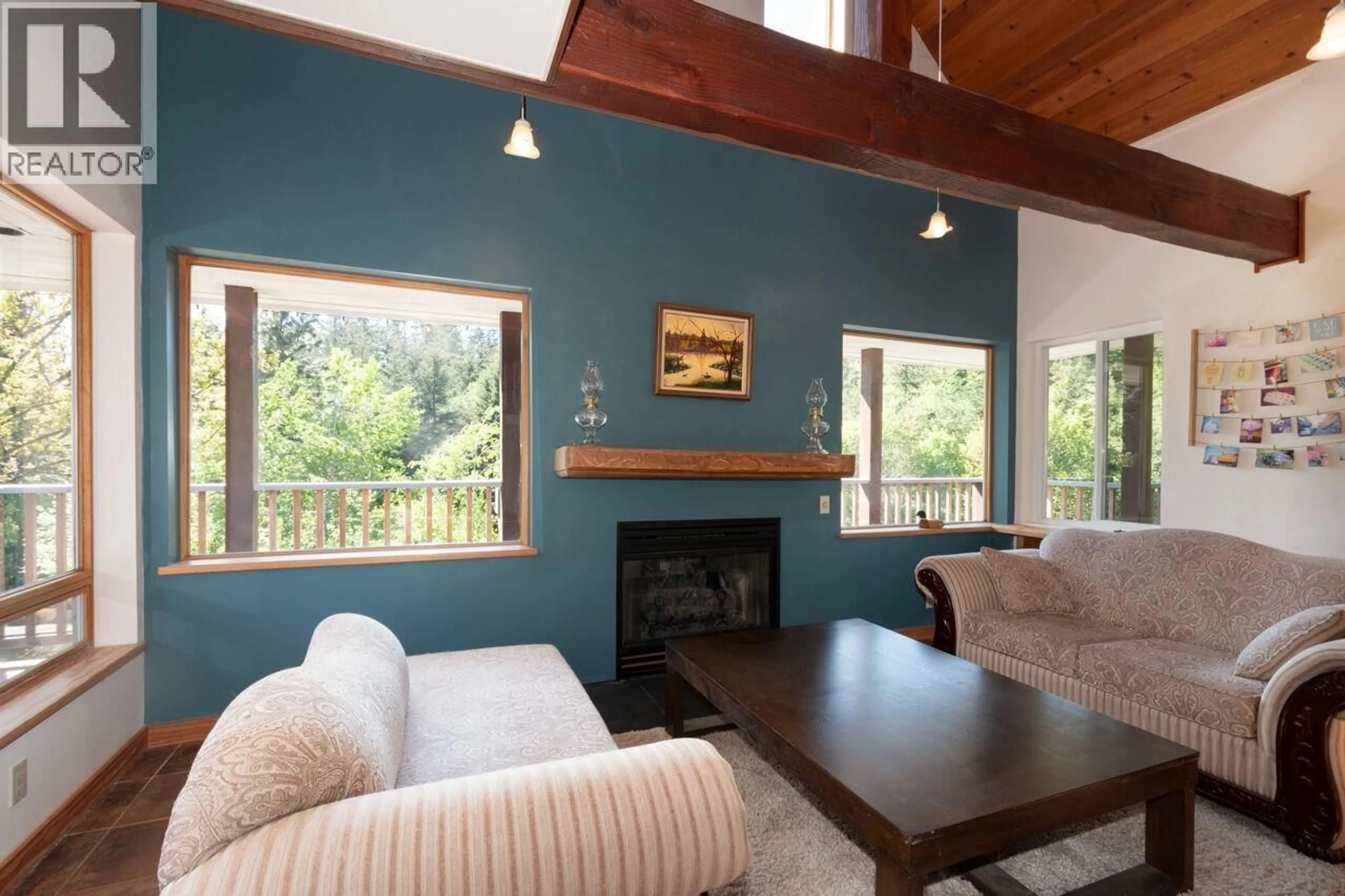 Living room with furniture, wood/laminate floor for 1293 WESTSIDE ROAD, Bowen Island British Columbia V0N1G2