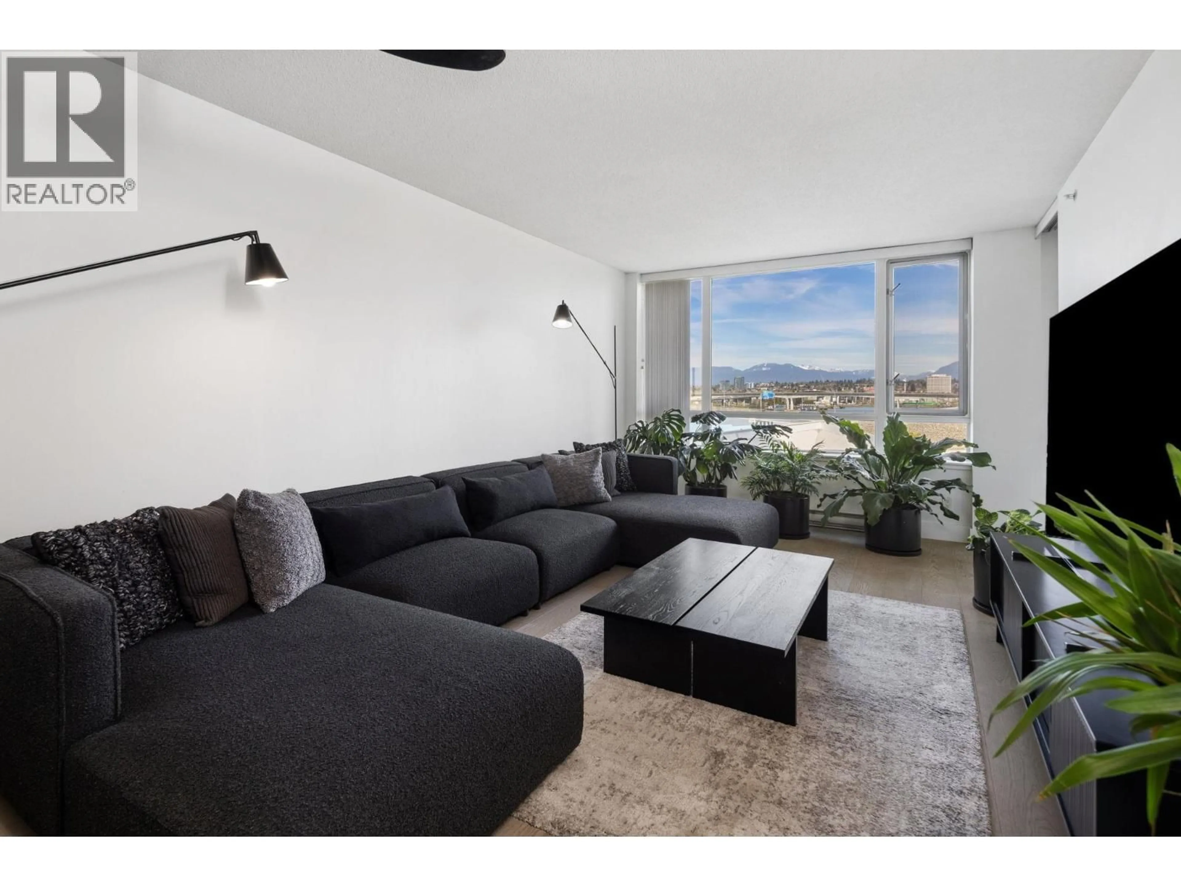 Living room with furniture, unknown for 701 - 3333 CORVETTE WAY, Richmond British Columbia V6X0E3